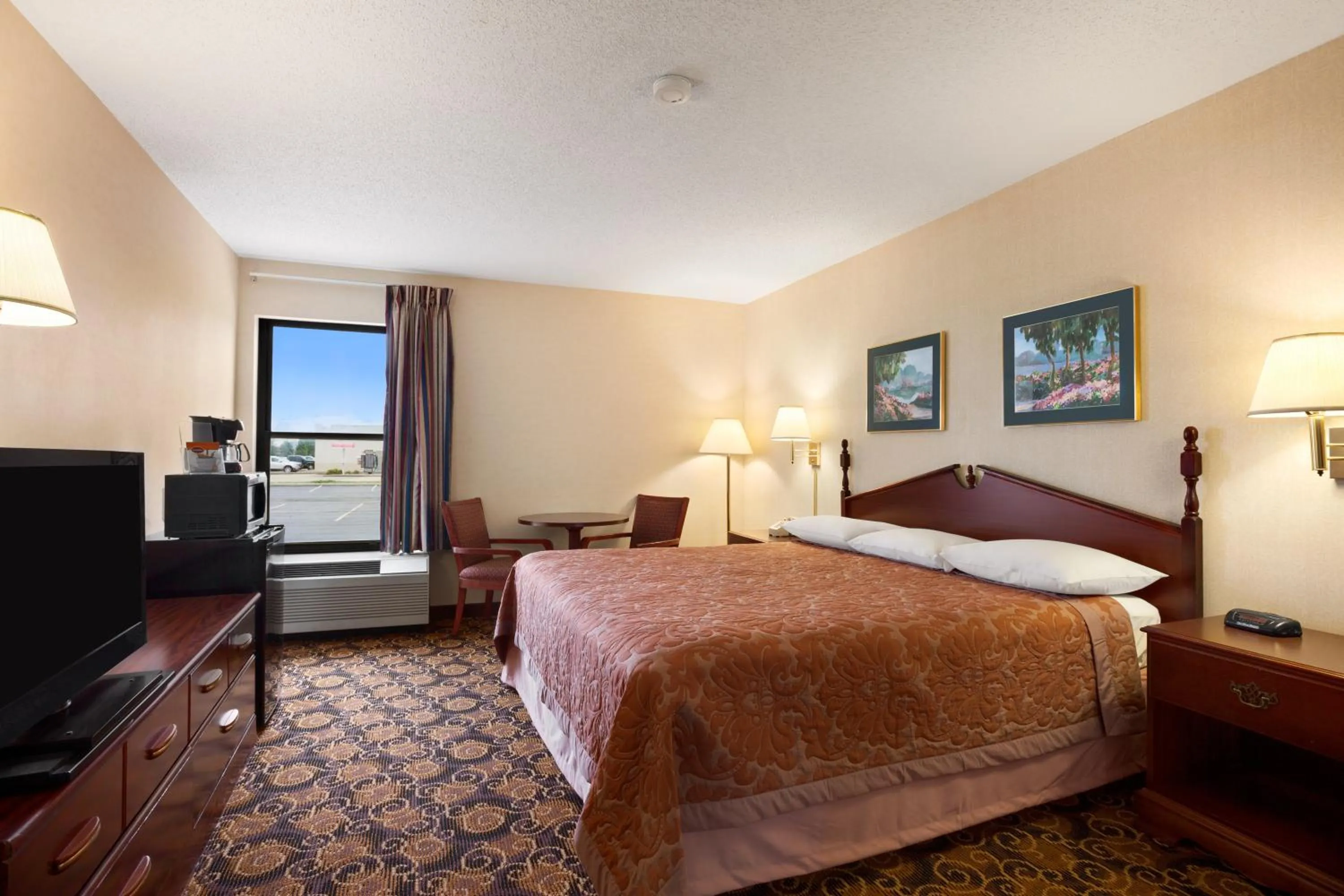 Bed in Super 8 by Wyndham Evansville North