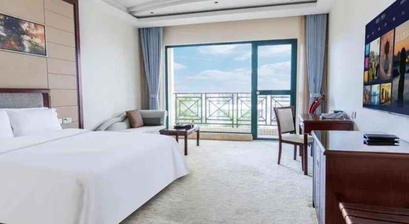 Bed in Dongguan Metropolitan Yijing Hotel