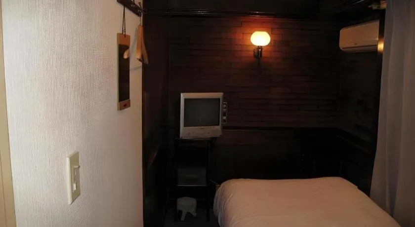 Bed in Itabashi Hotel Hilltop