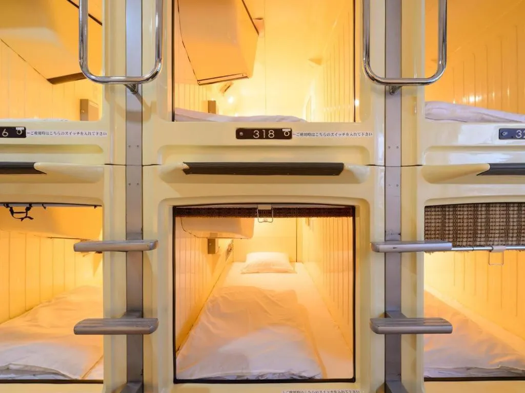 Bed in Itabashi Hotel Hilltop