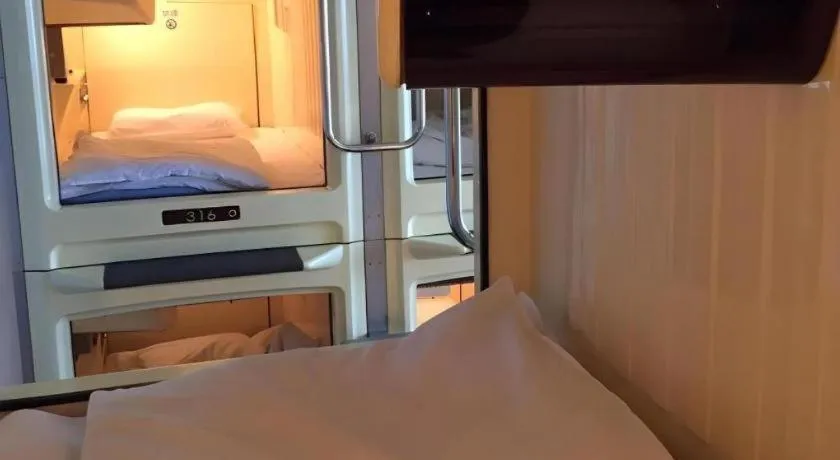 Bed in Itabashi Hotel Hilltop