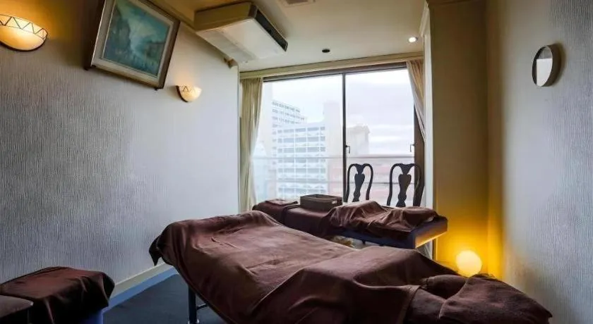 Bed in Itabashi Hotel Hilltop