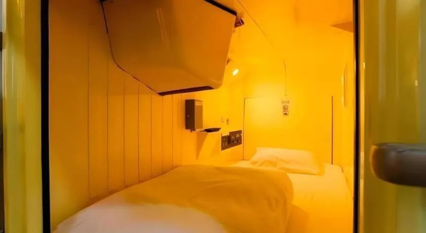 Bed in Itabashi Hotel Hilltop