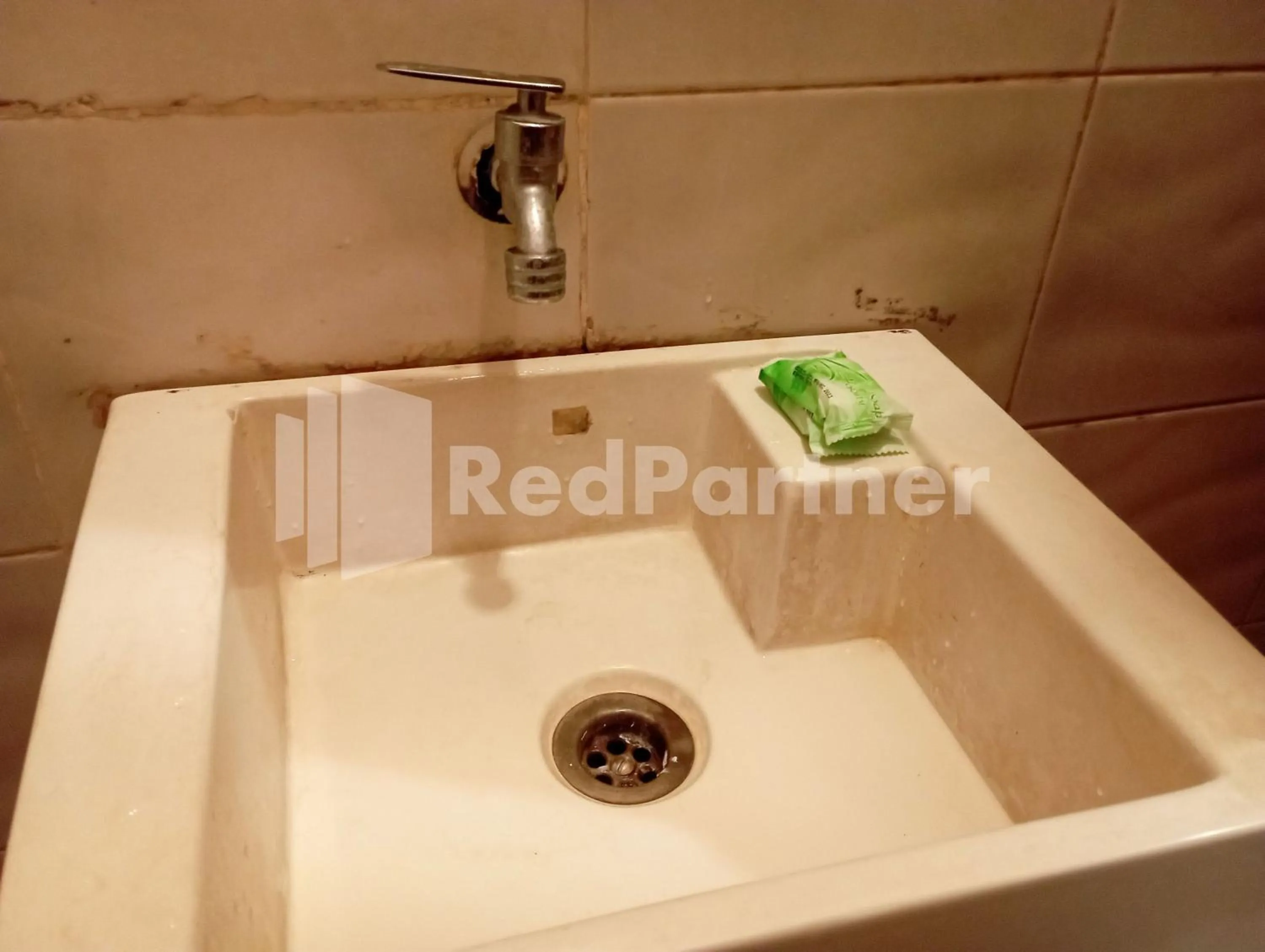 Bathroom in Nillo Hotel Kebumen Mitra RedDoorz