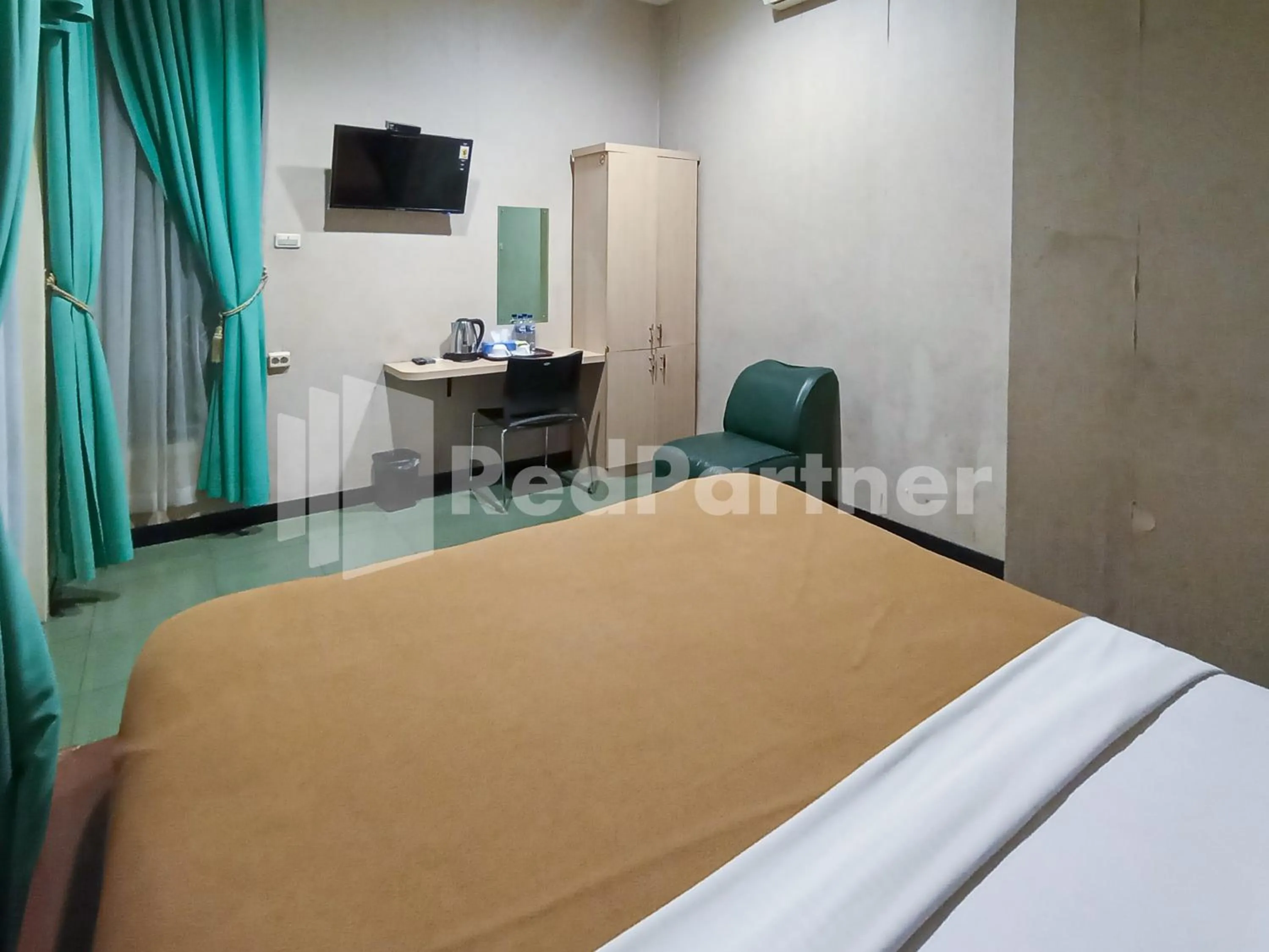 Bedroom in Nillo Hotel Kebumen Mitra RedDoorz