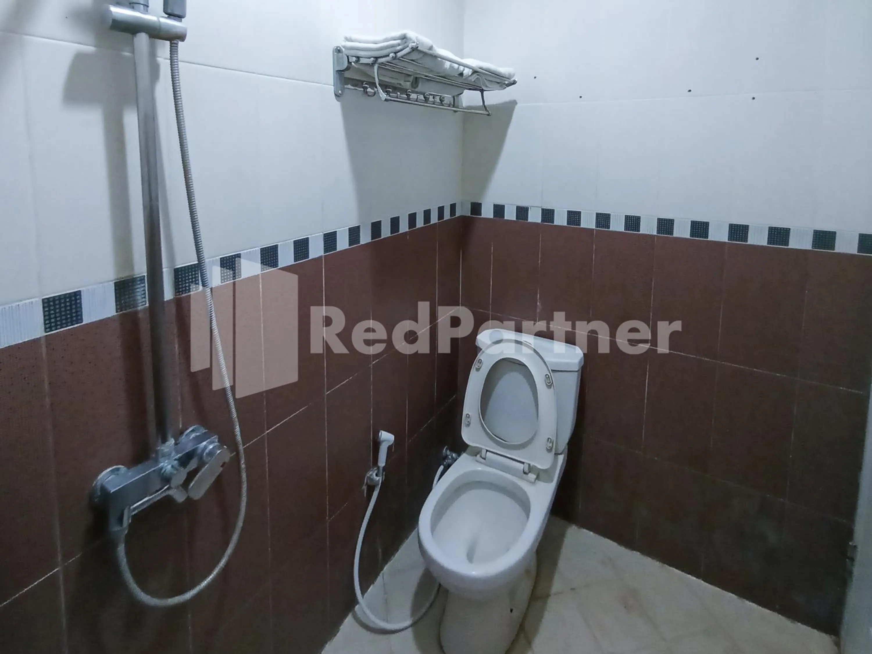 Bathroom in Nillo Hotel Kebumen Mitra RedDoorz
