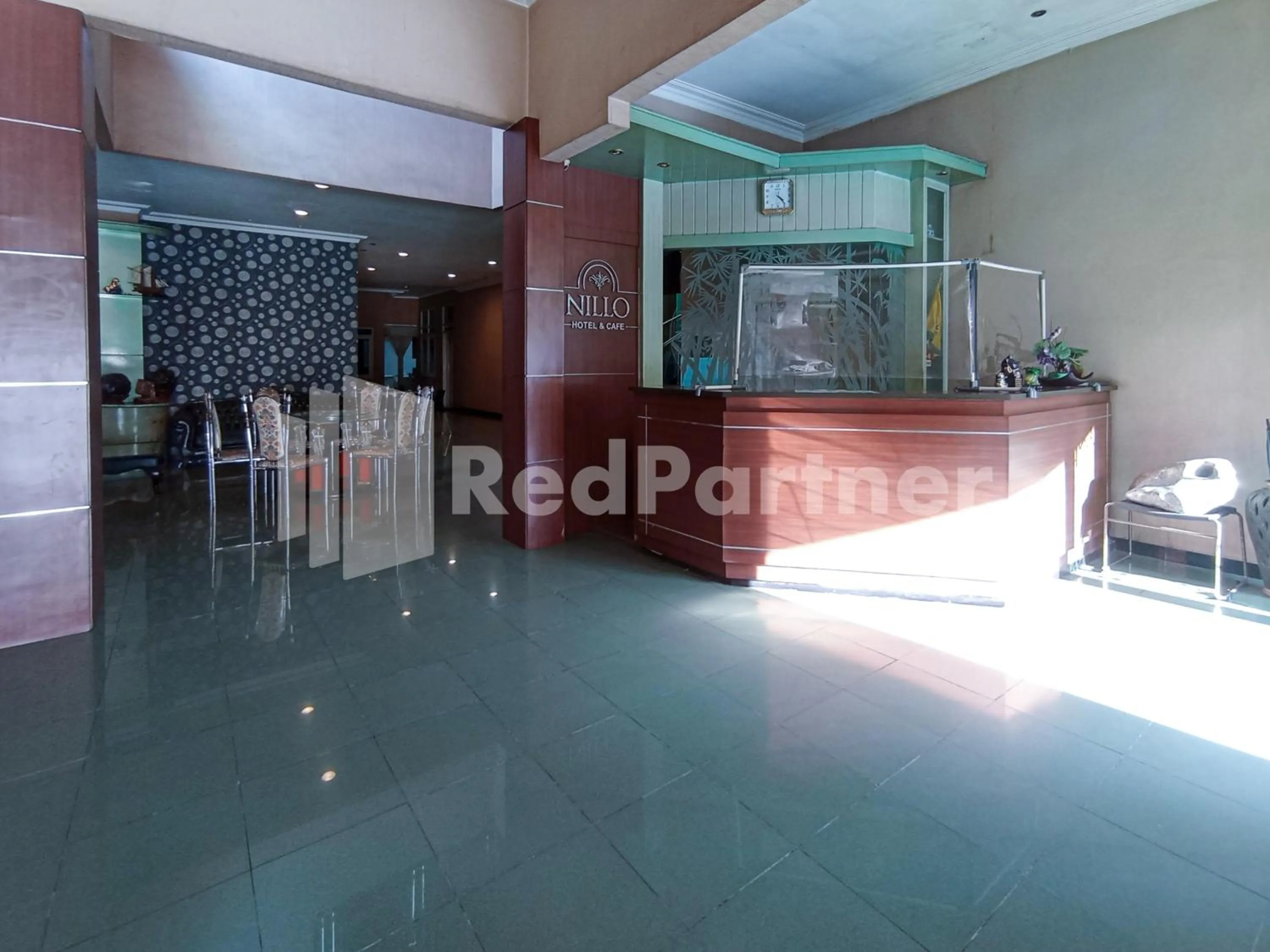 Lobby or reception in Nillo Hotel Kebumen Mitra RedDoorz