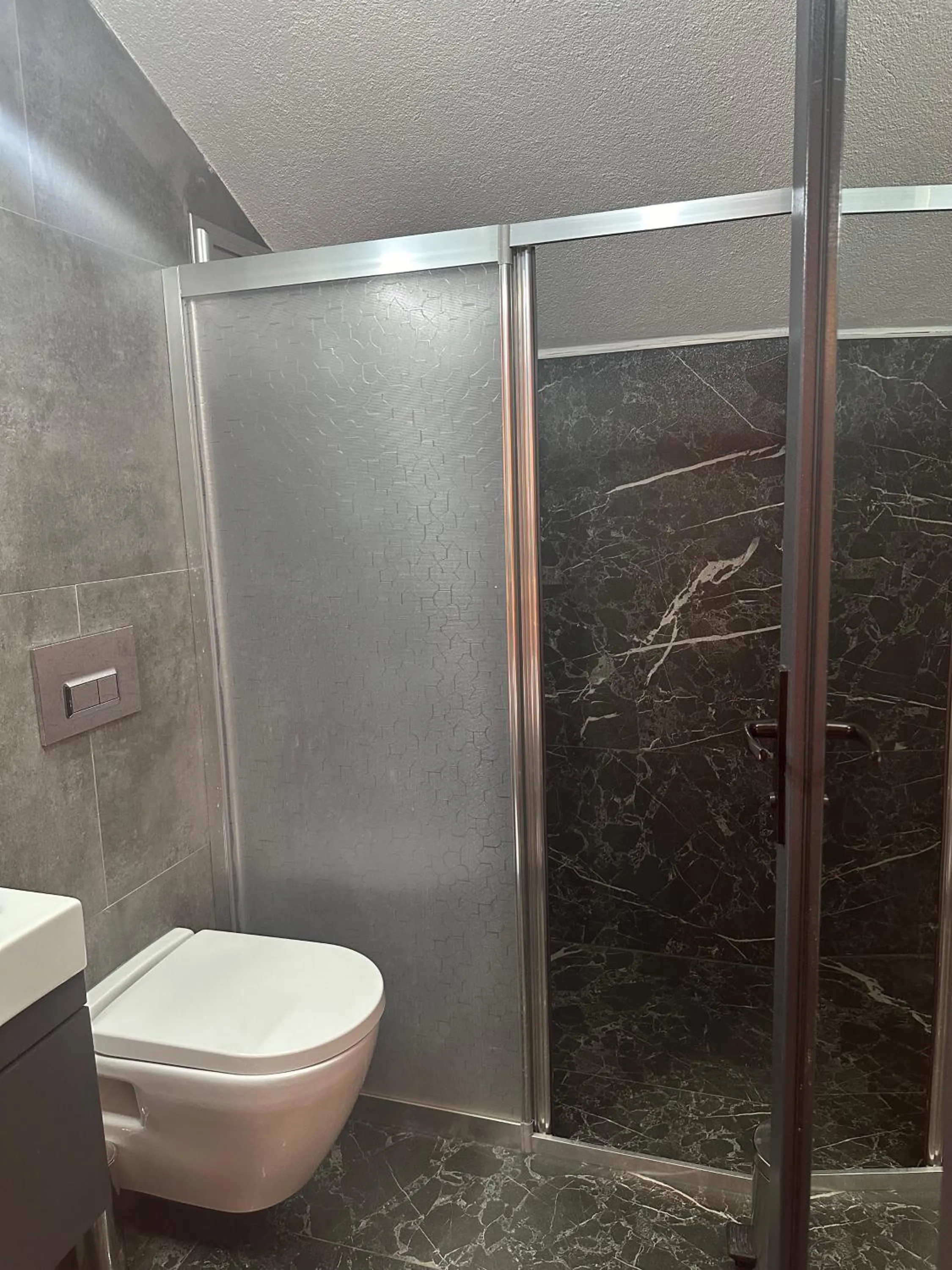 Shower in PUGARi HOTEL