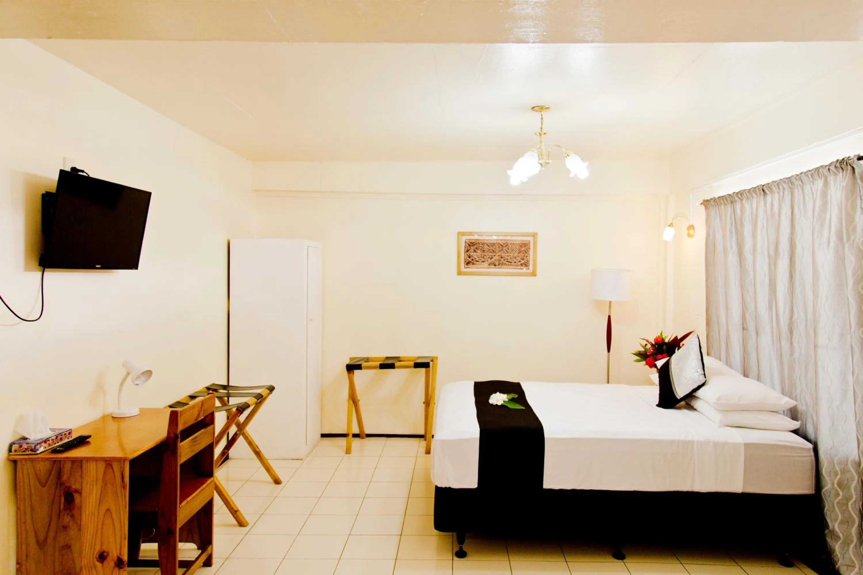 Photo of the whole room, Bed in Moatoga Hotel