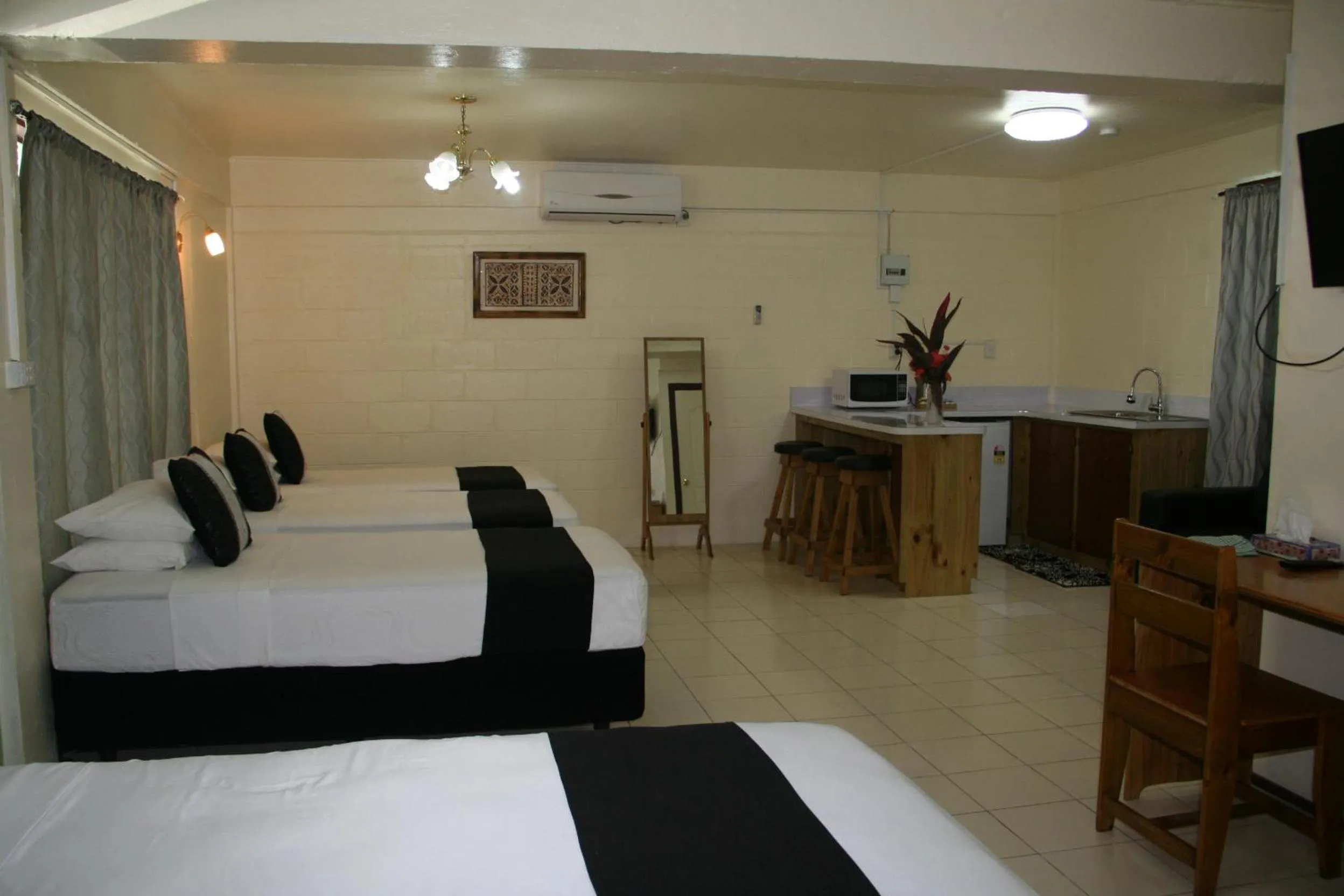 Photo of the whole room, Bed in Moatoga Hotel