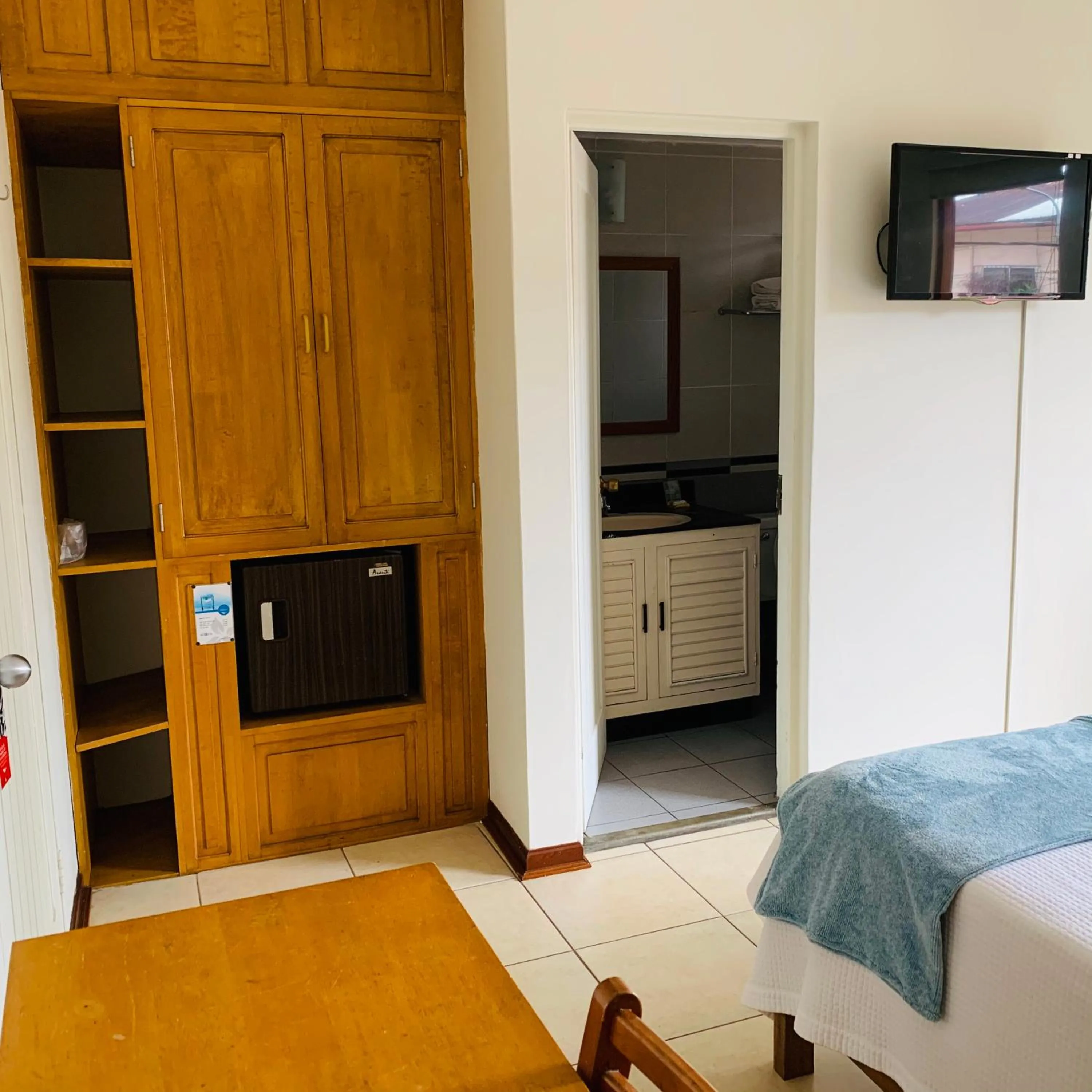 Bathroom, Bed in Hotel Acosta
