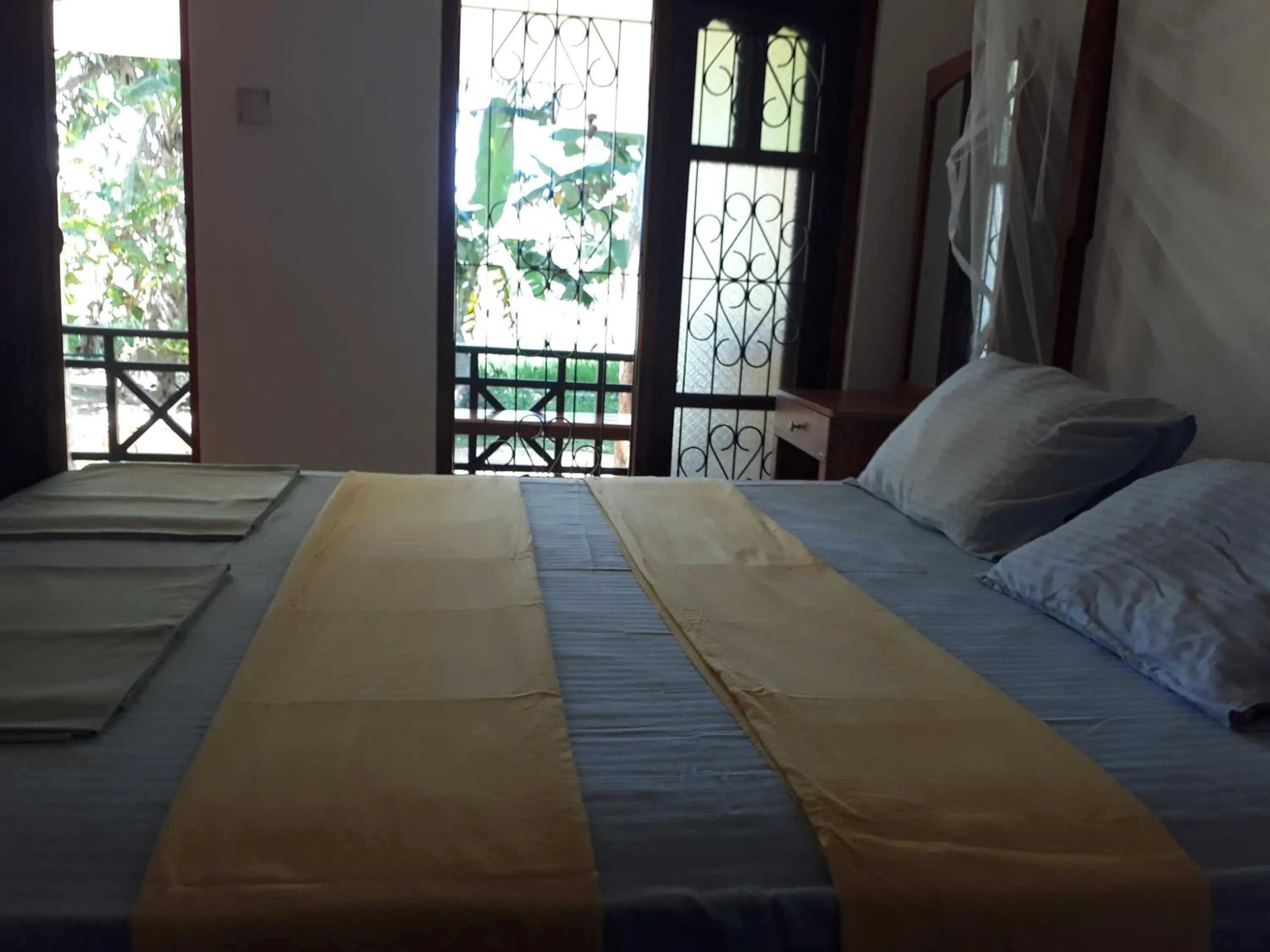 Bedroom, Bed in Traveller's Home Hotel