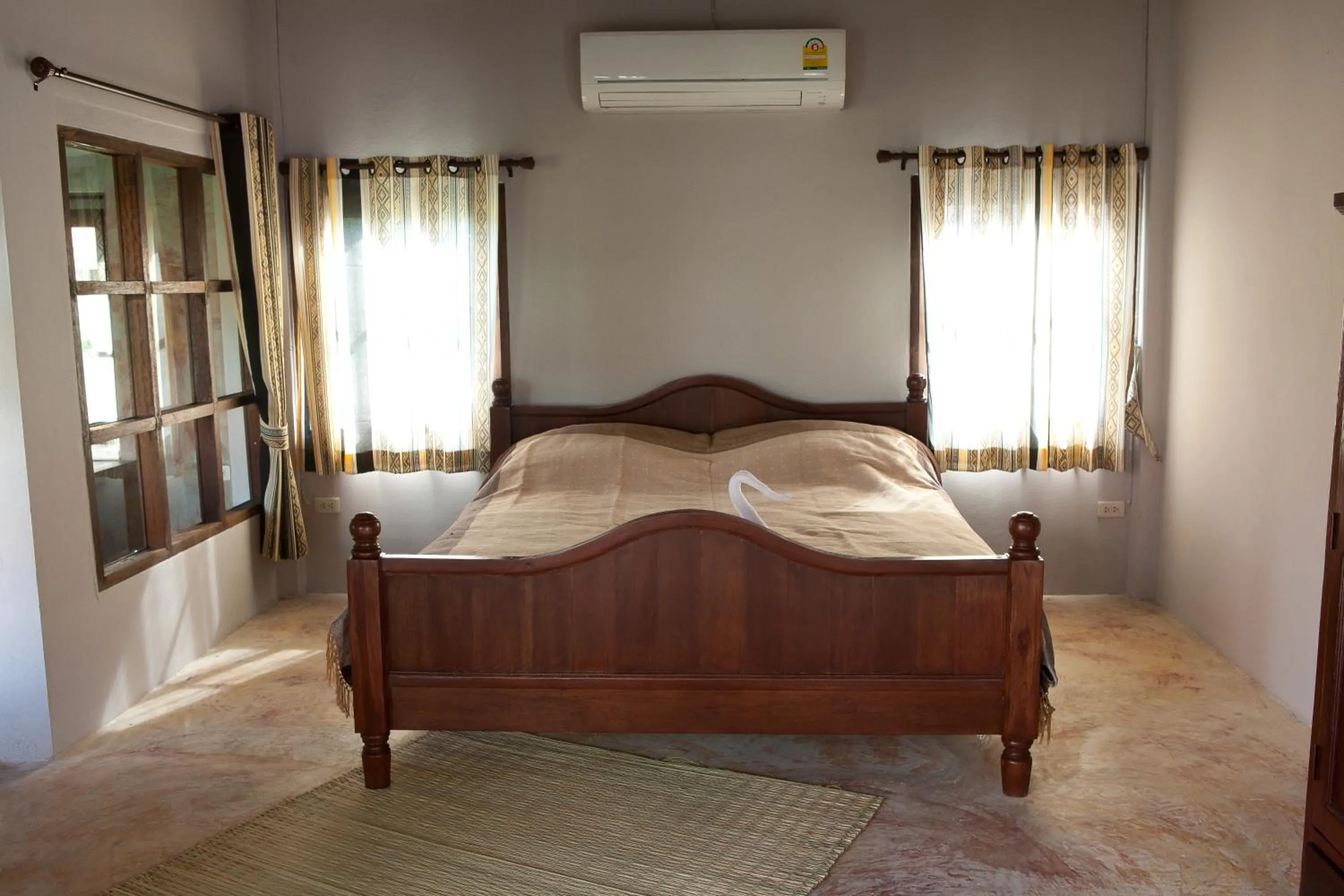 Bed in Chiangmai Royal Creek Hotel