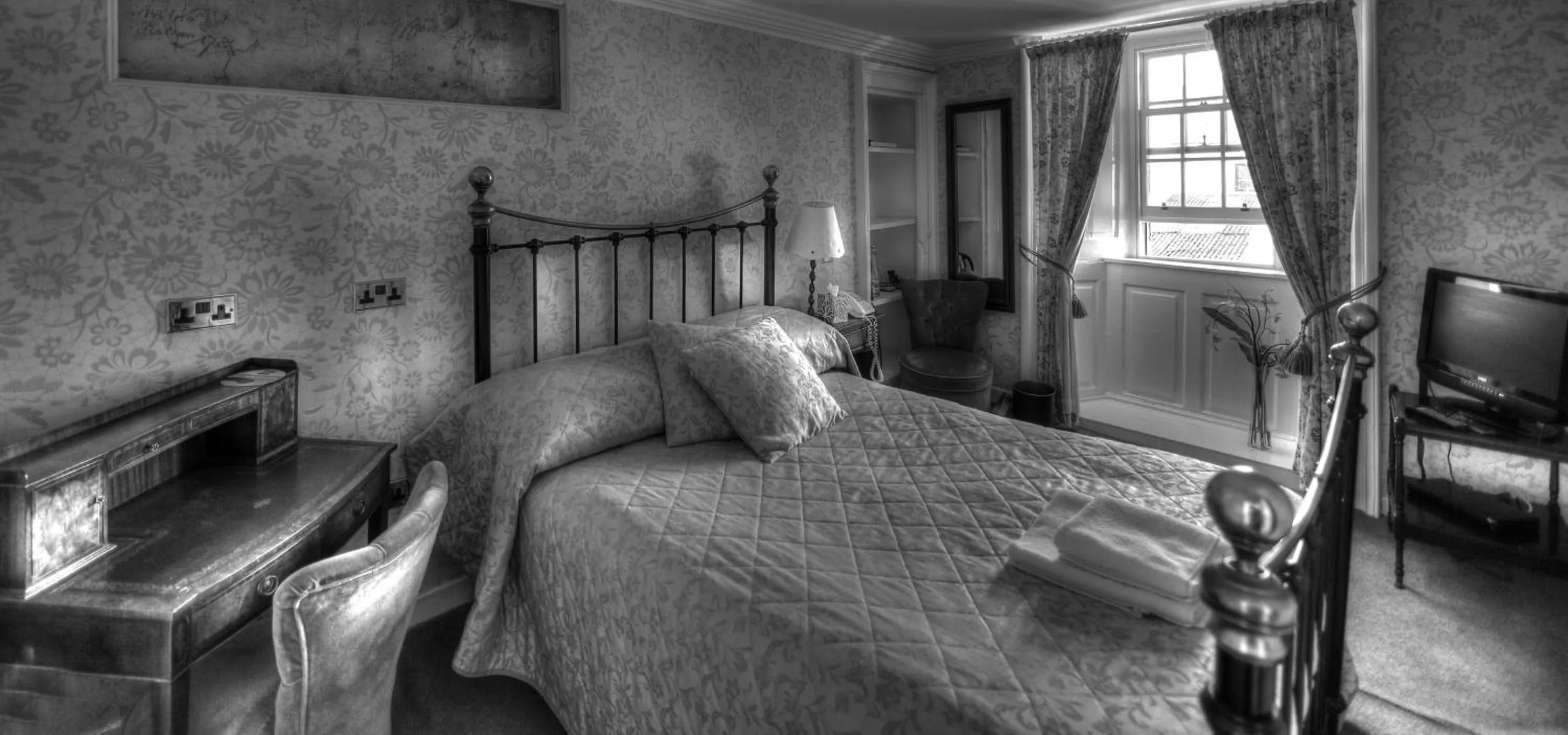 Decorative detail, Bed in Busta House Hotel