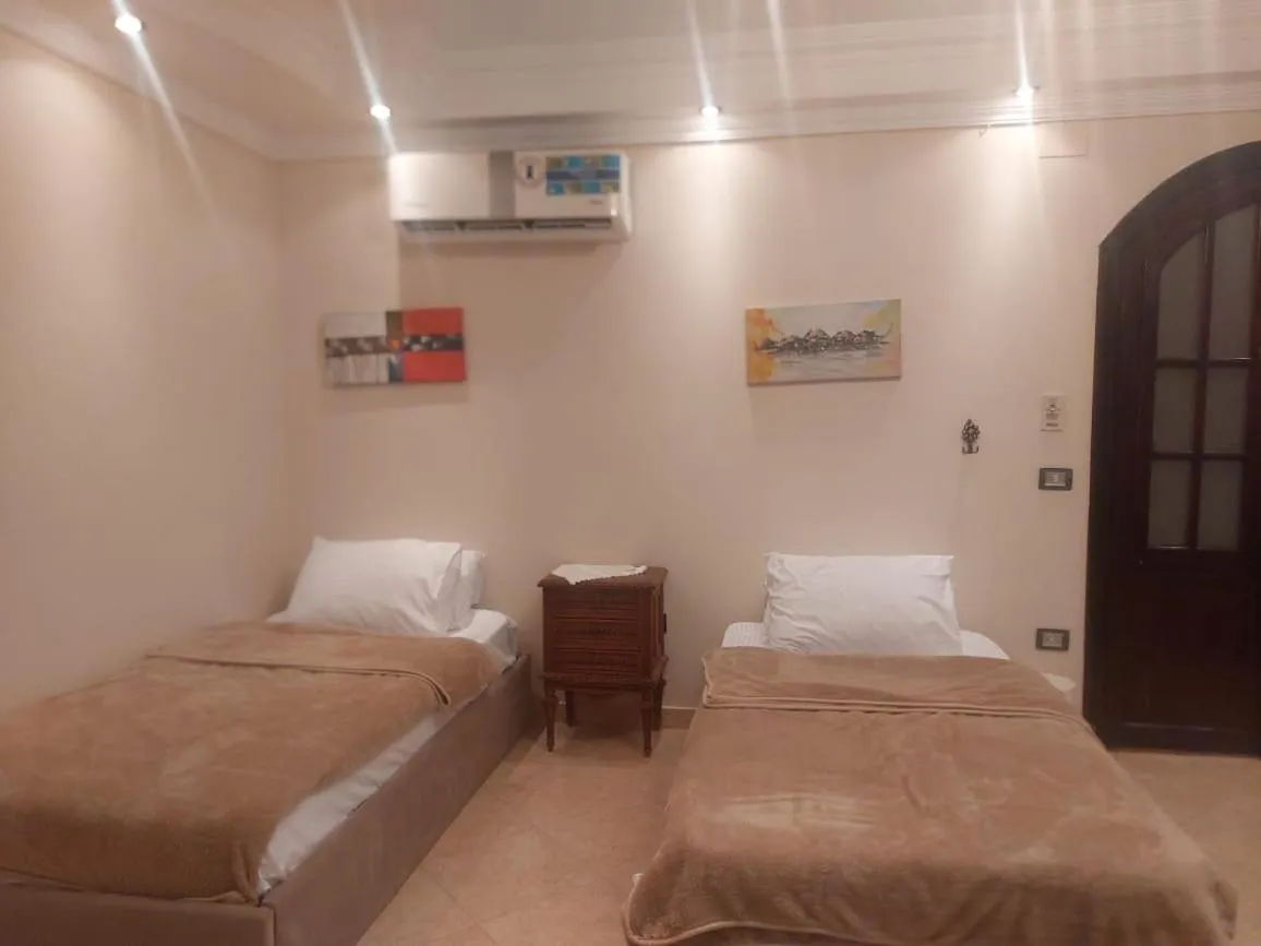 Bed in Queen of the pyramids hotel