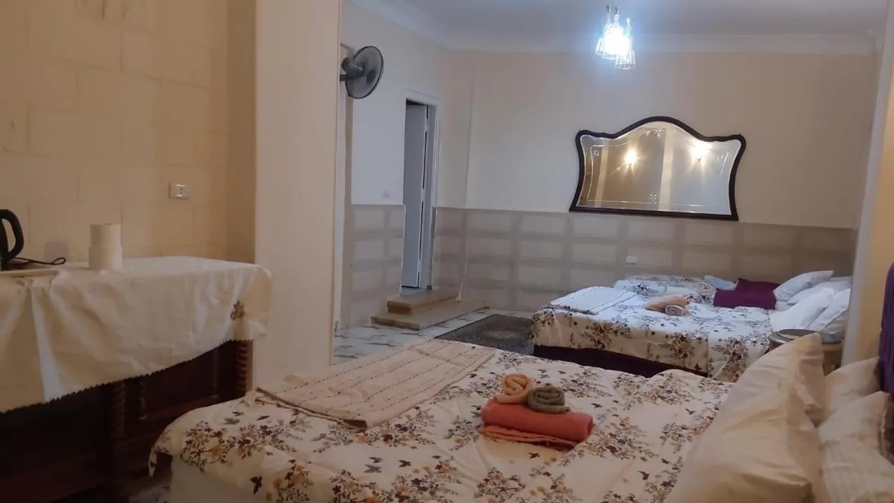 Bed in Queen of the pyramids hotel