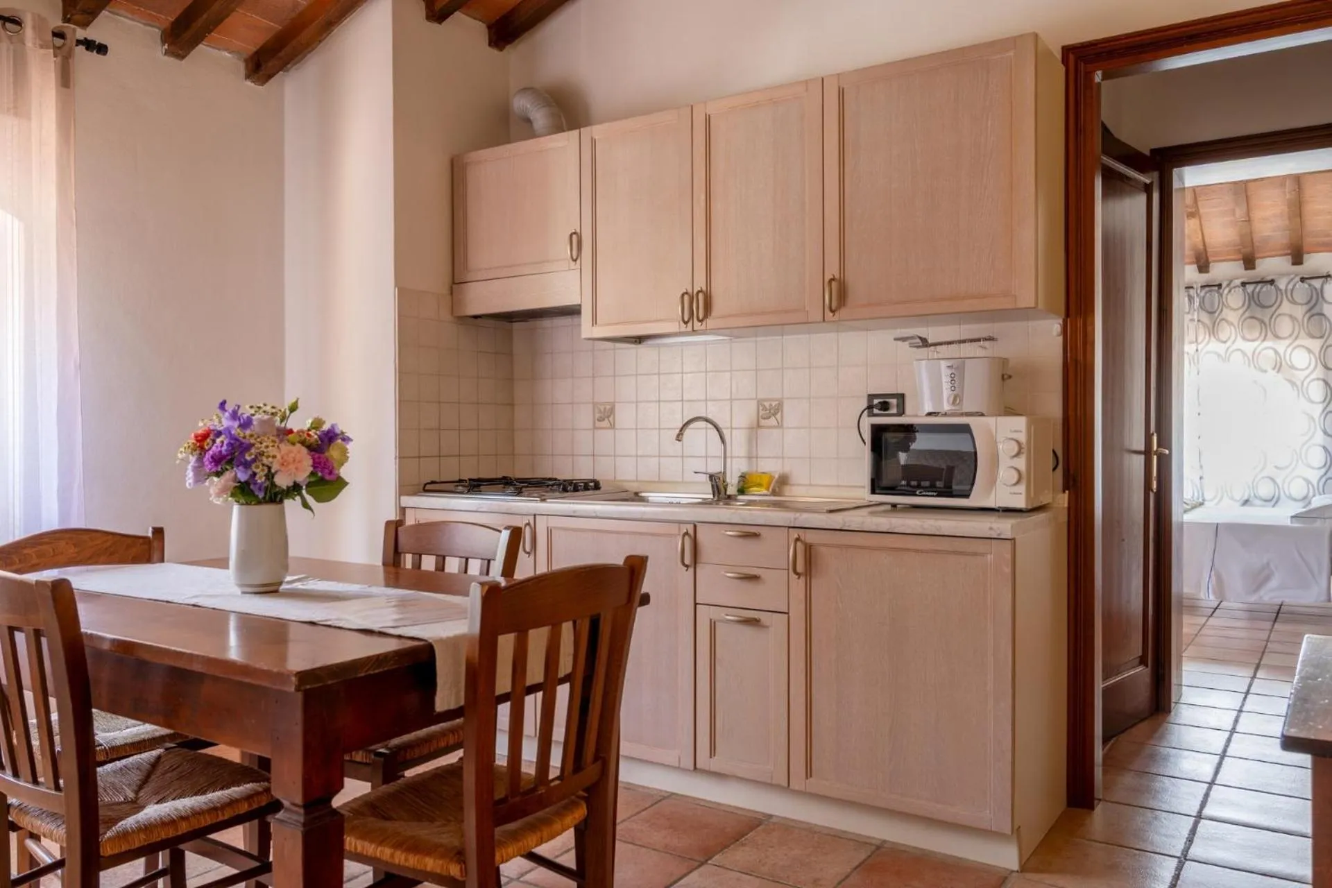 Kitchen or kitchenette in Borgo San Martino - Residence Hotel & SPA