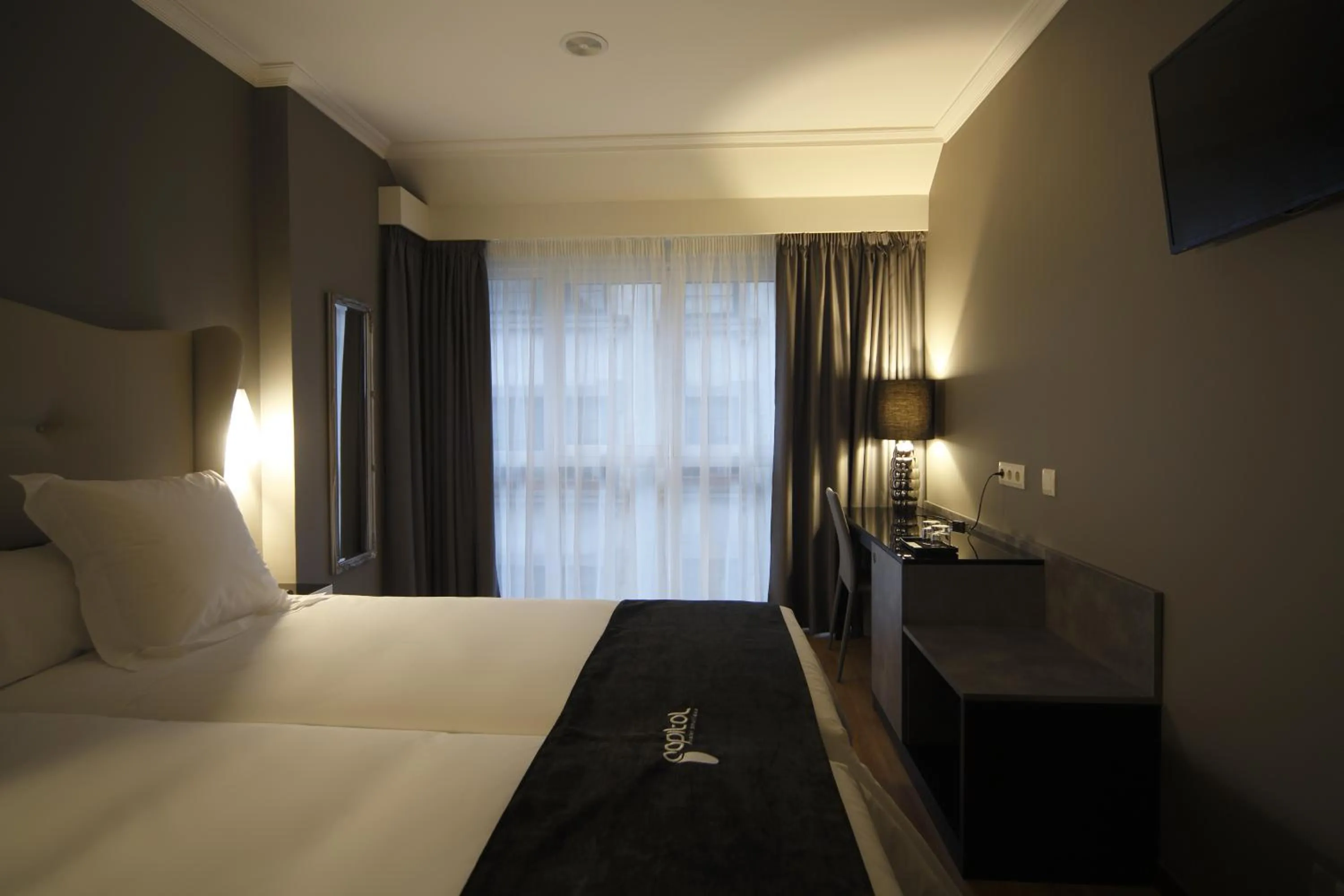 Bedroom, Bed in Capitol Boutique Hotel