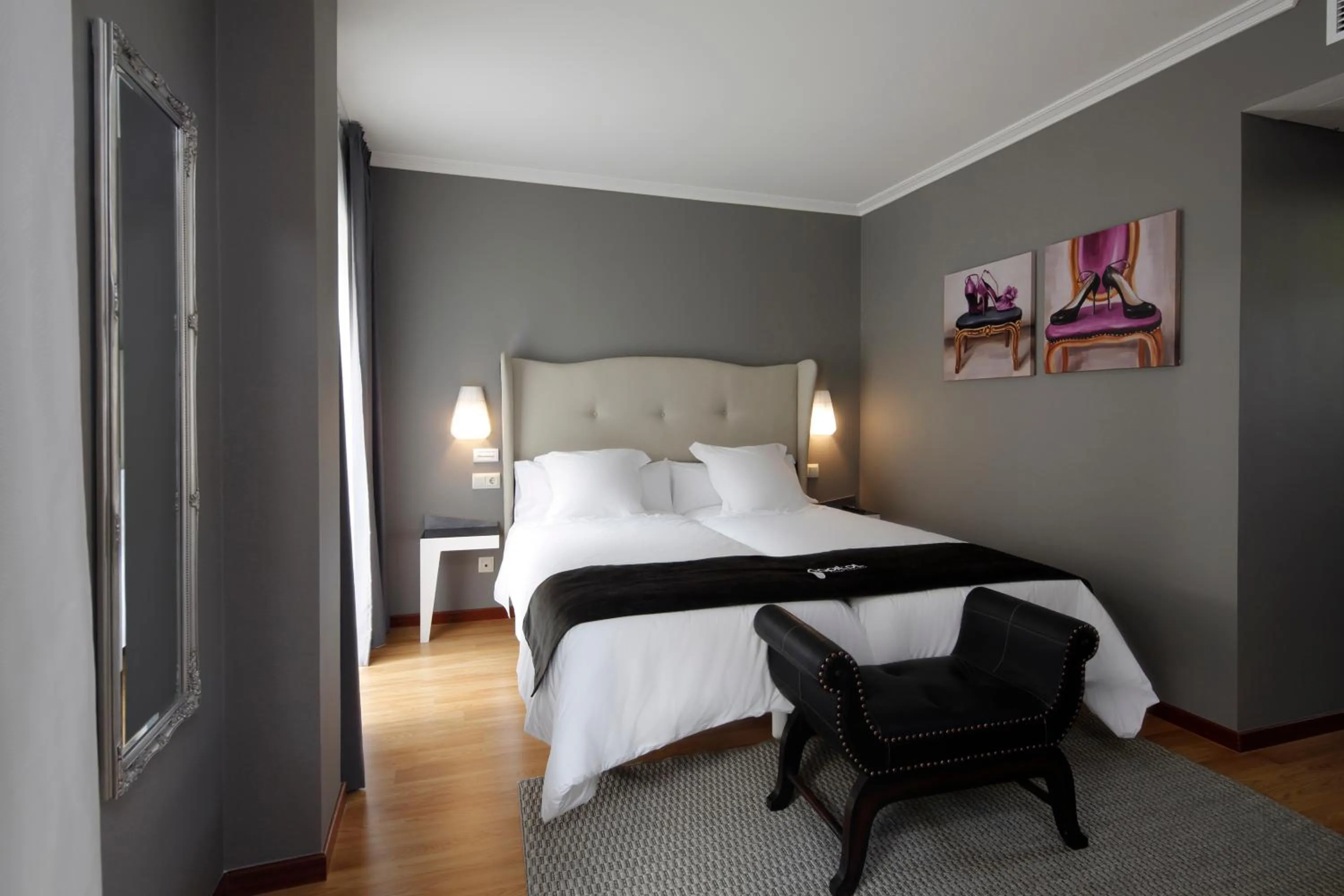 Bed in Capitol Boutique Hotel