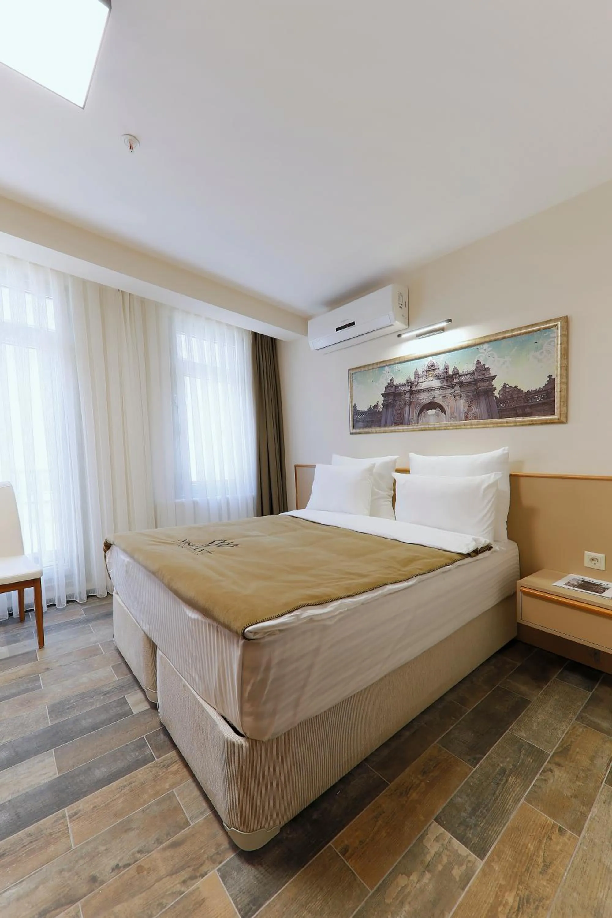 Photo of the whole room, Bed in Nishant Hotel