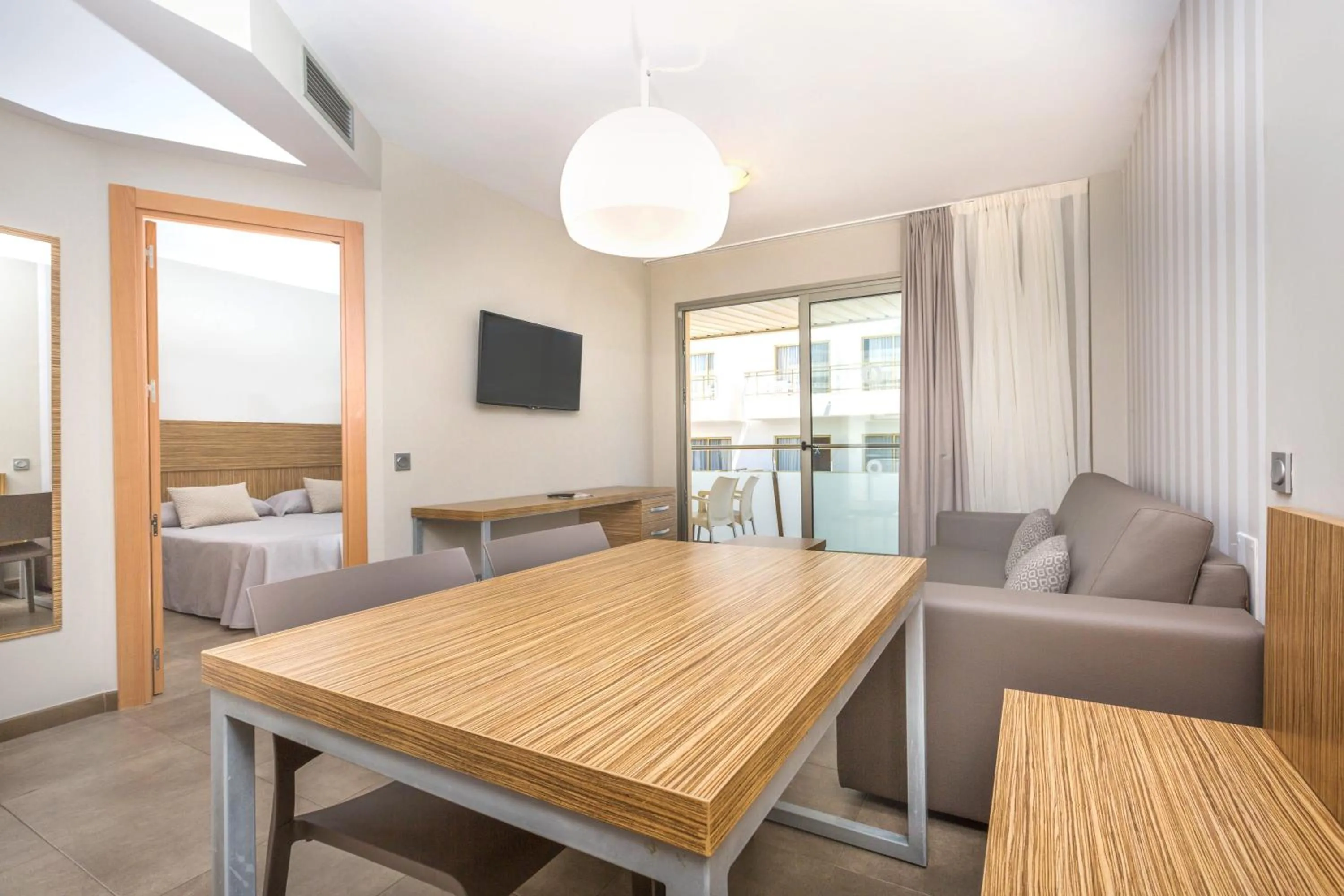 Seating area in Aparthotel Odissea Park