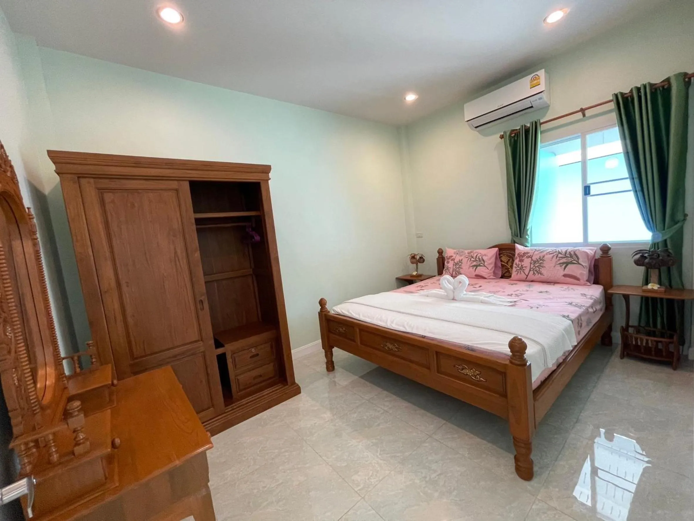 Bed in Blue Beach Bungalow