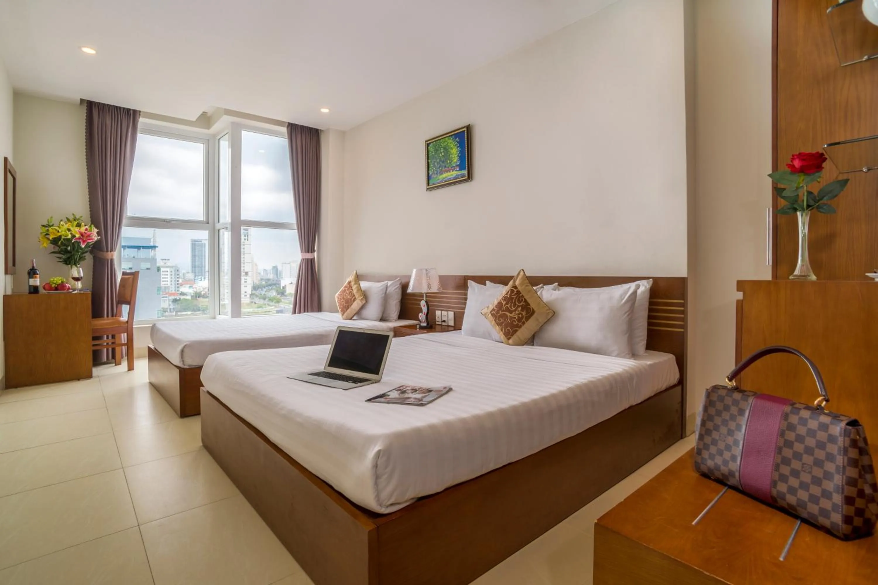 Bed in Golden Light Da Nang Hotel