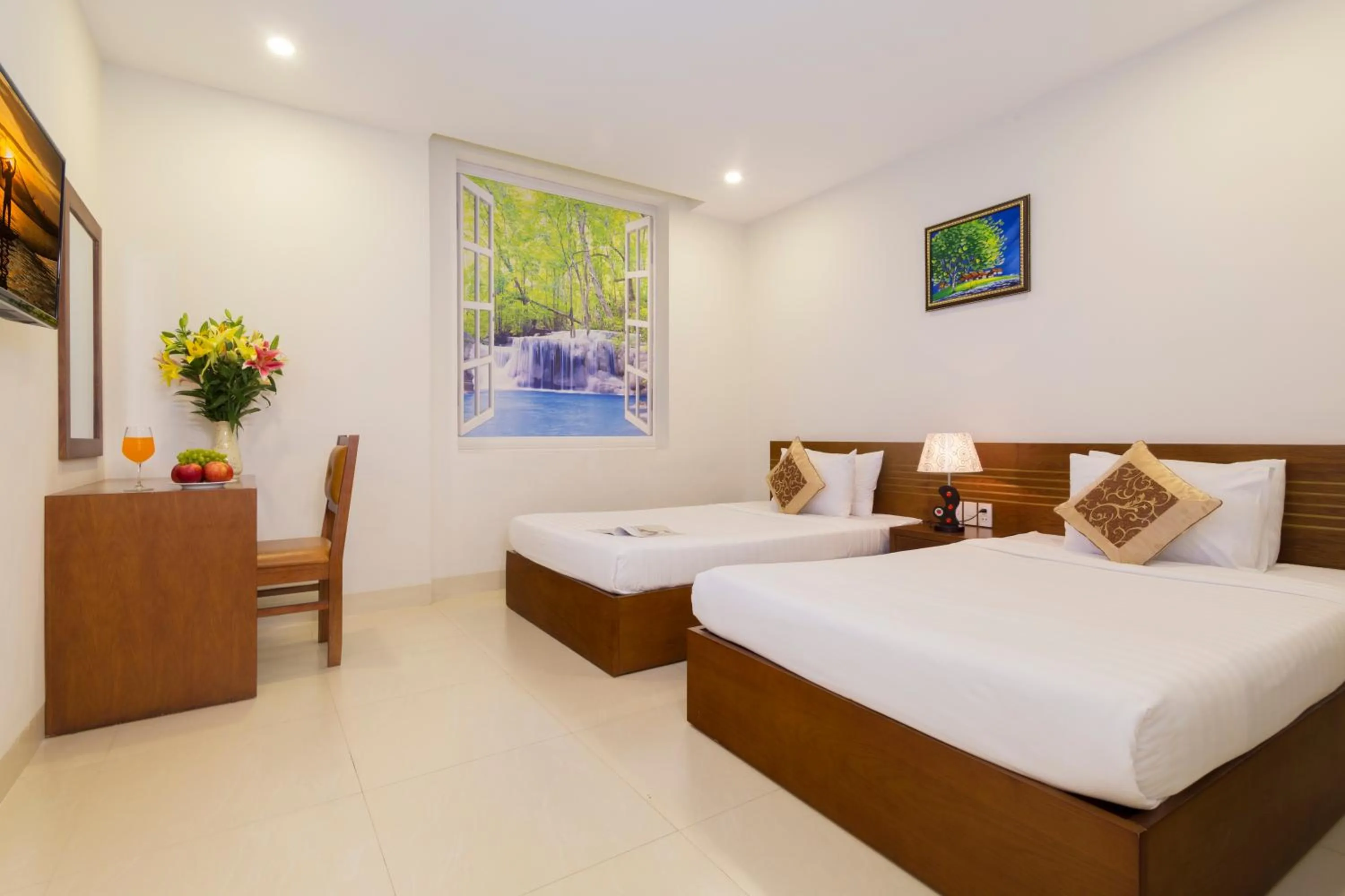 Bed in Golden Light Da Nang Hotel