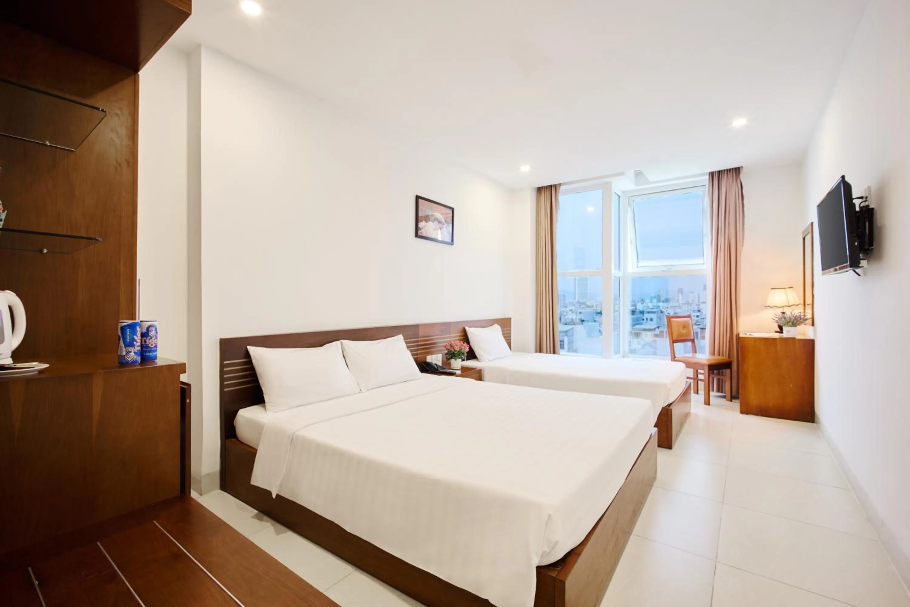 Bed in Golden Light Da Nang Hotel