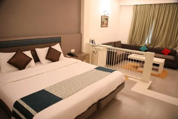 Photo of the whole room, Bed in Status Club Resort