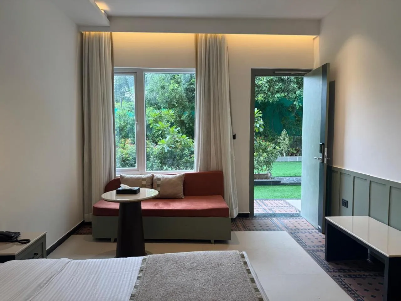 Seating area, Bed in Status Club Resort