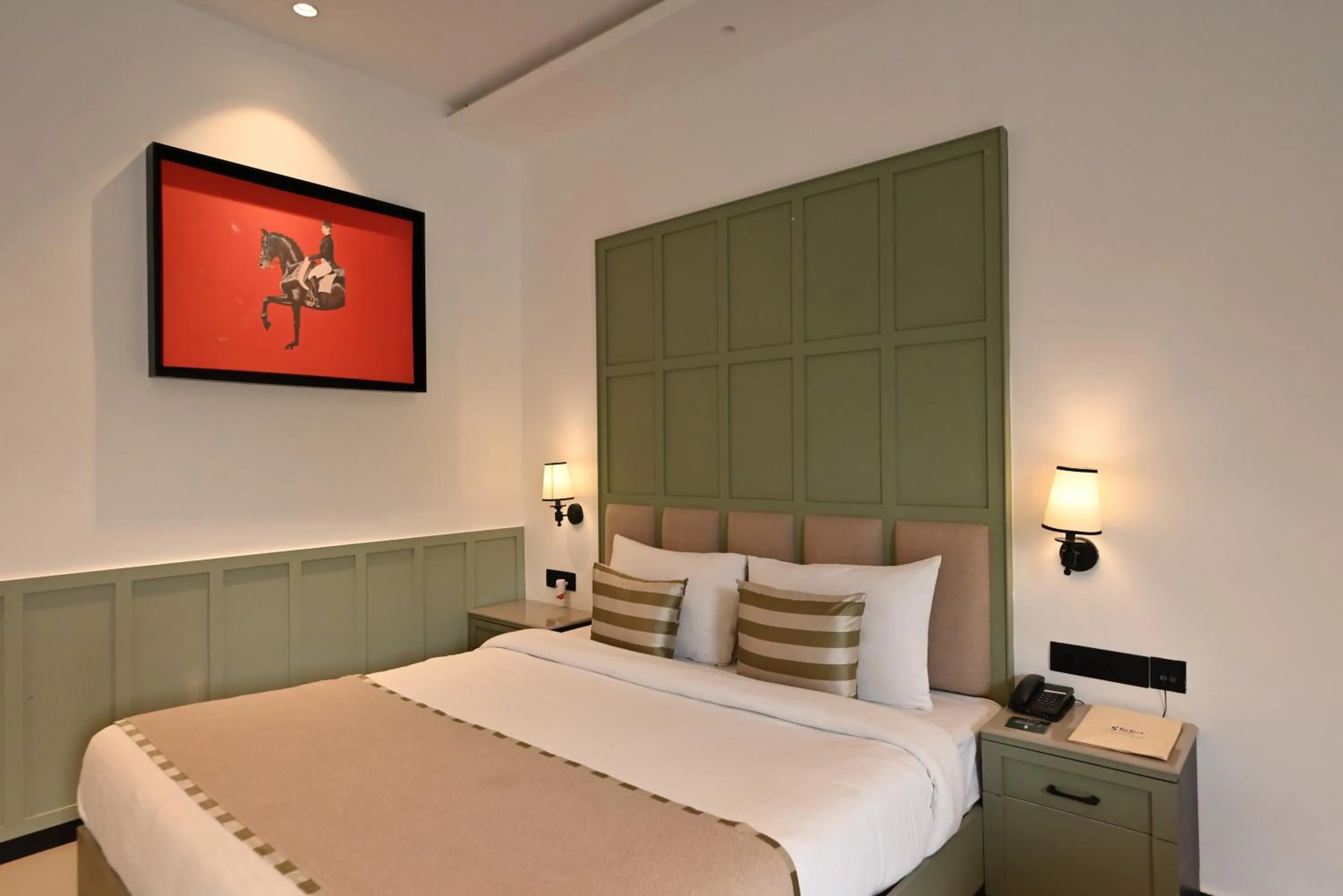 Bed in Status Club Resort