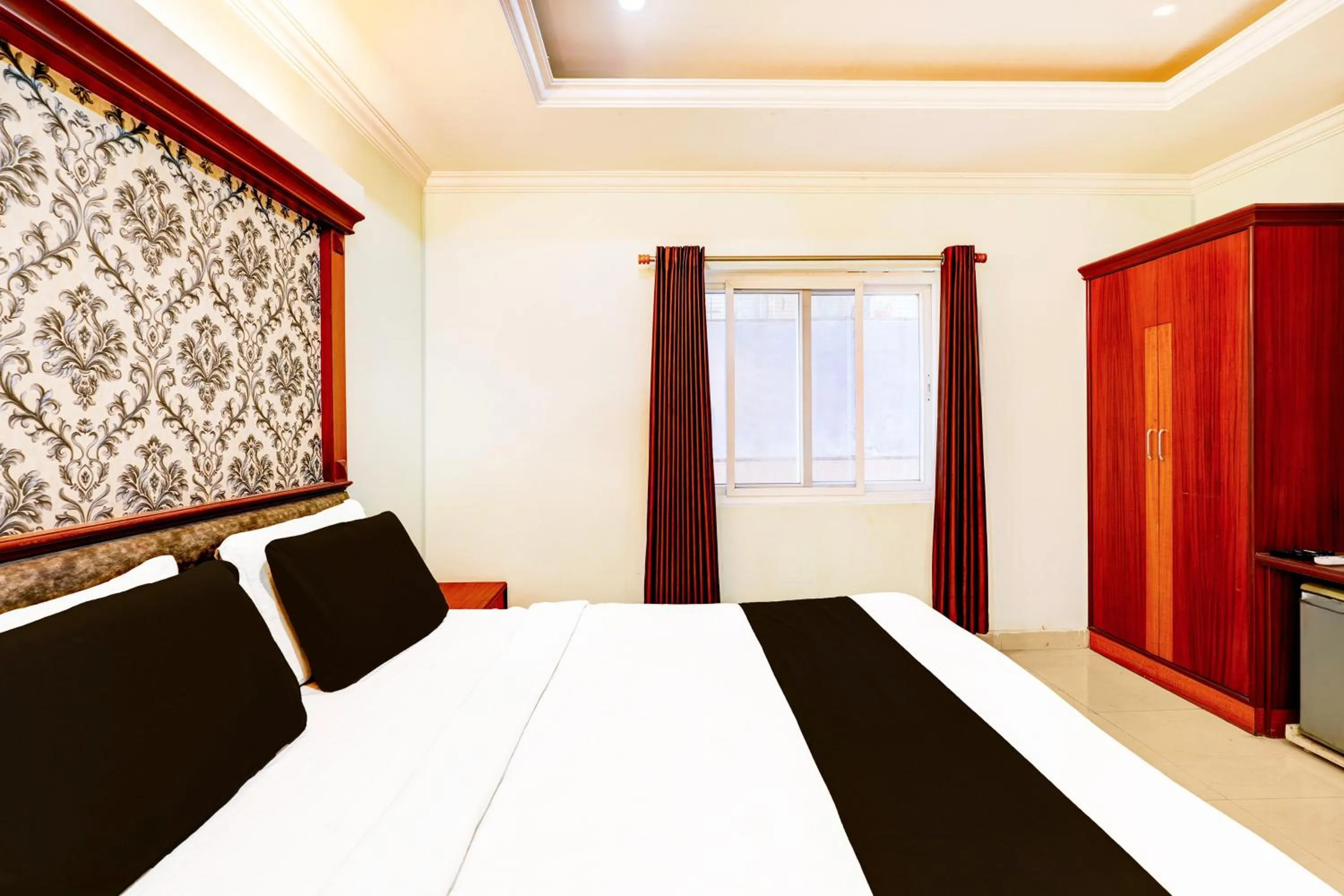 Bedroom, Bed in Super Townhouse Anantapur Near Srikantam Circle