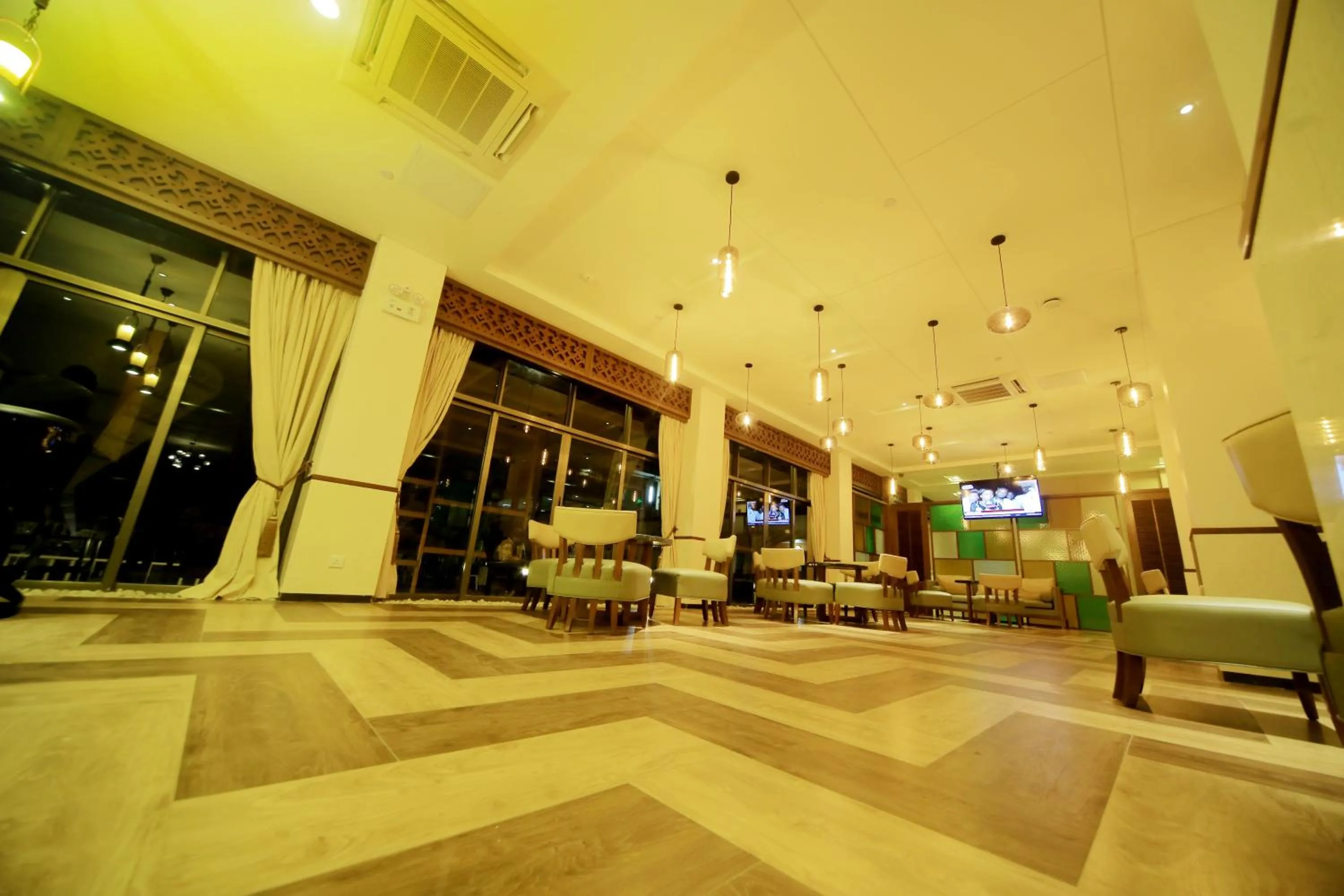 Communal lounge/ TV room in Hotel Africana