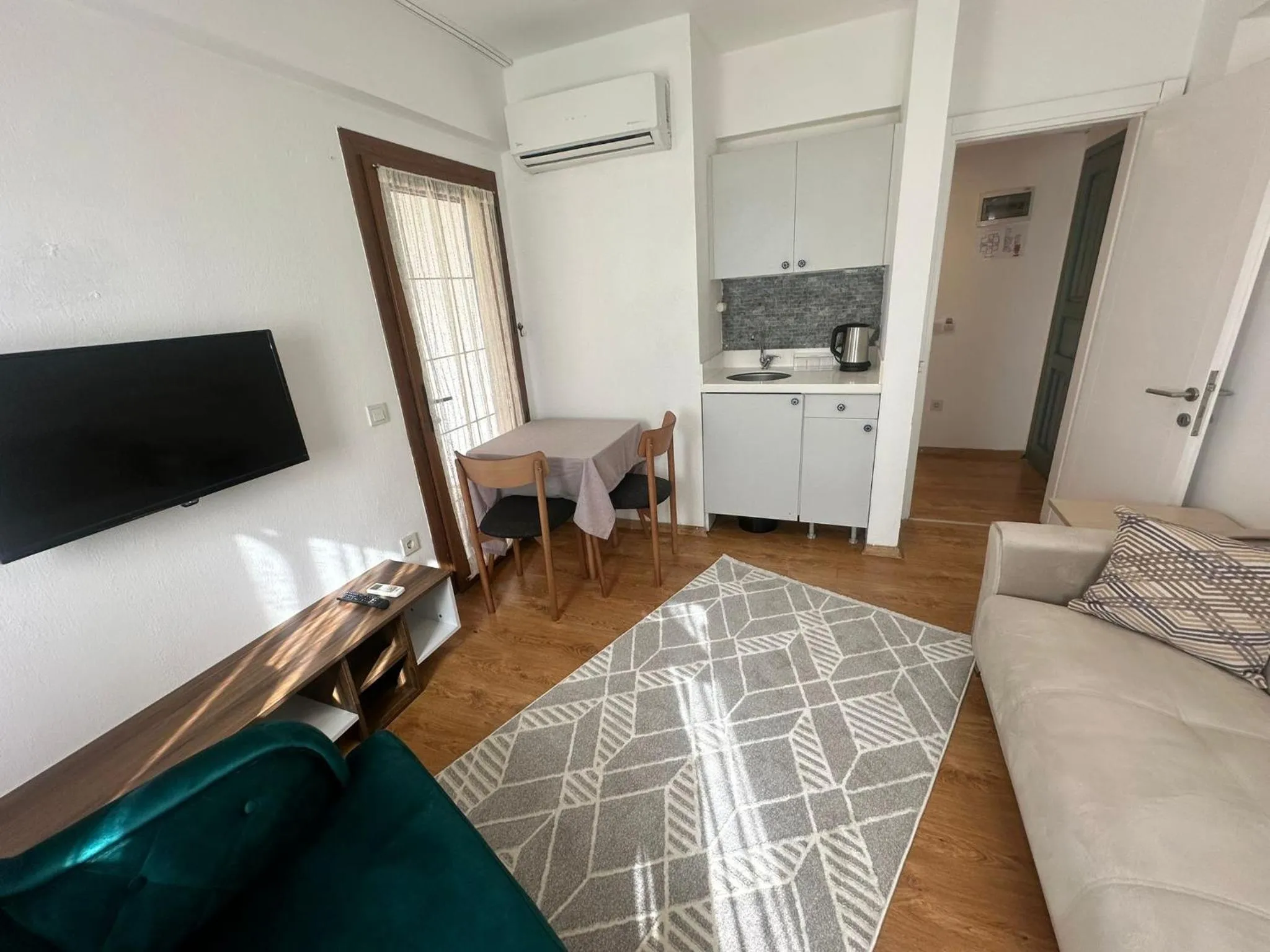 Living room, Bed in Wish Suites Bodrum Hotel