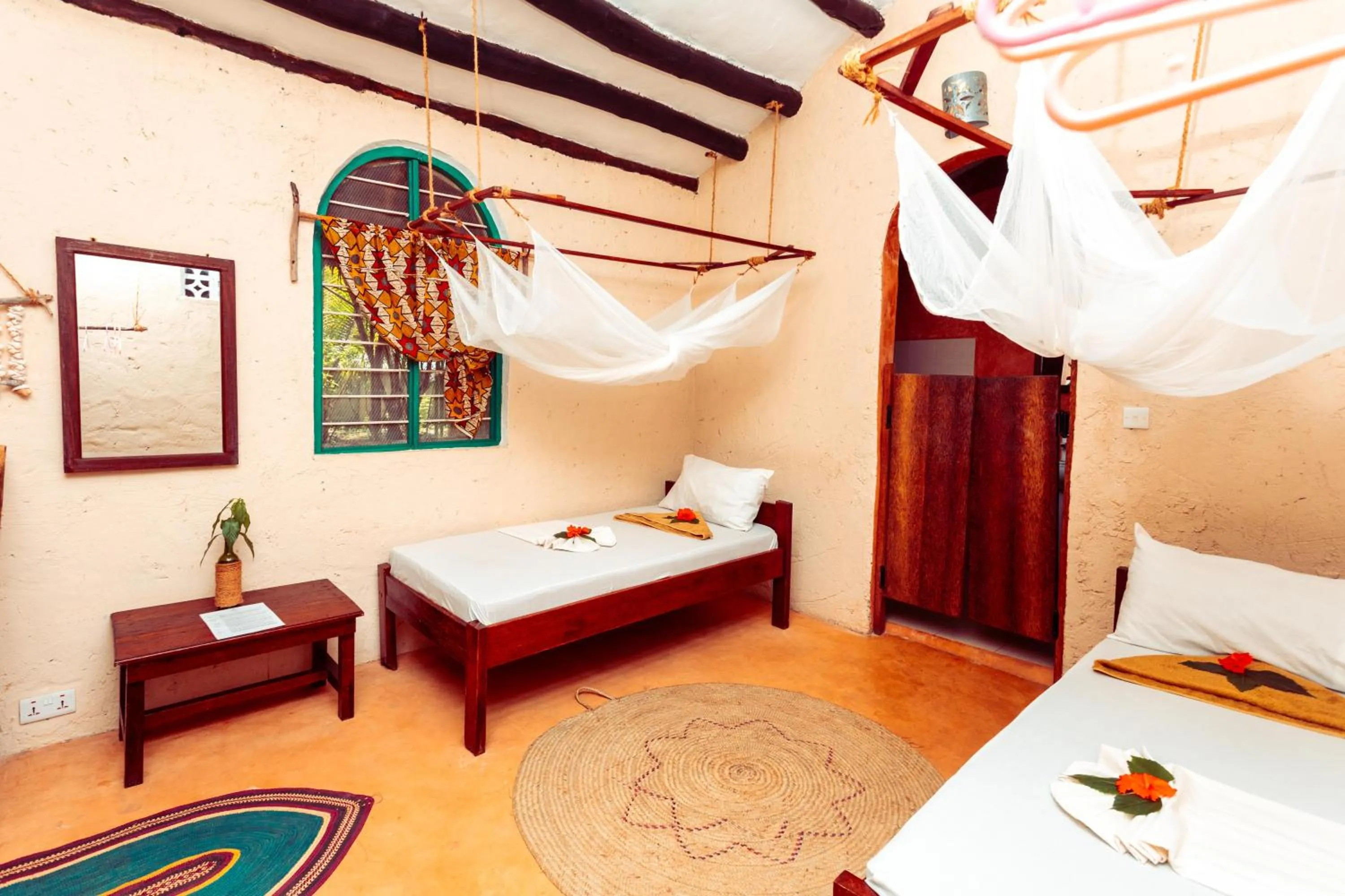 Bed in Demani Lodge Zanzibar