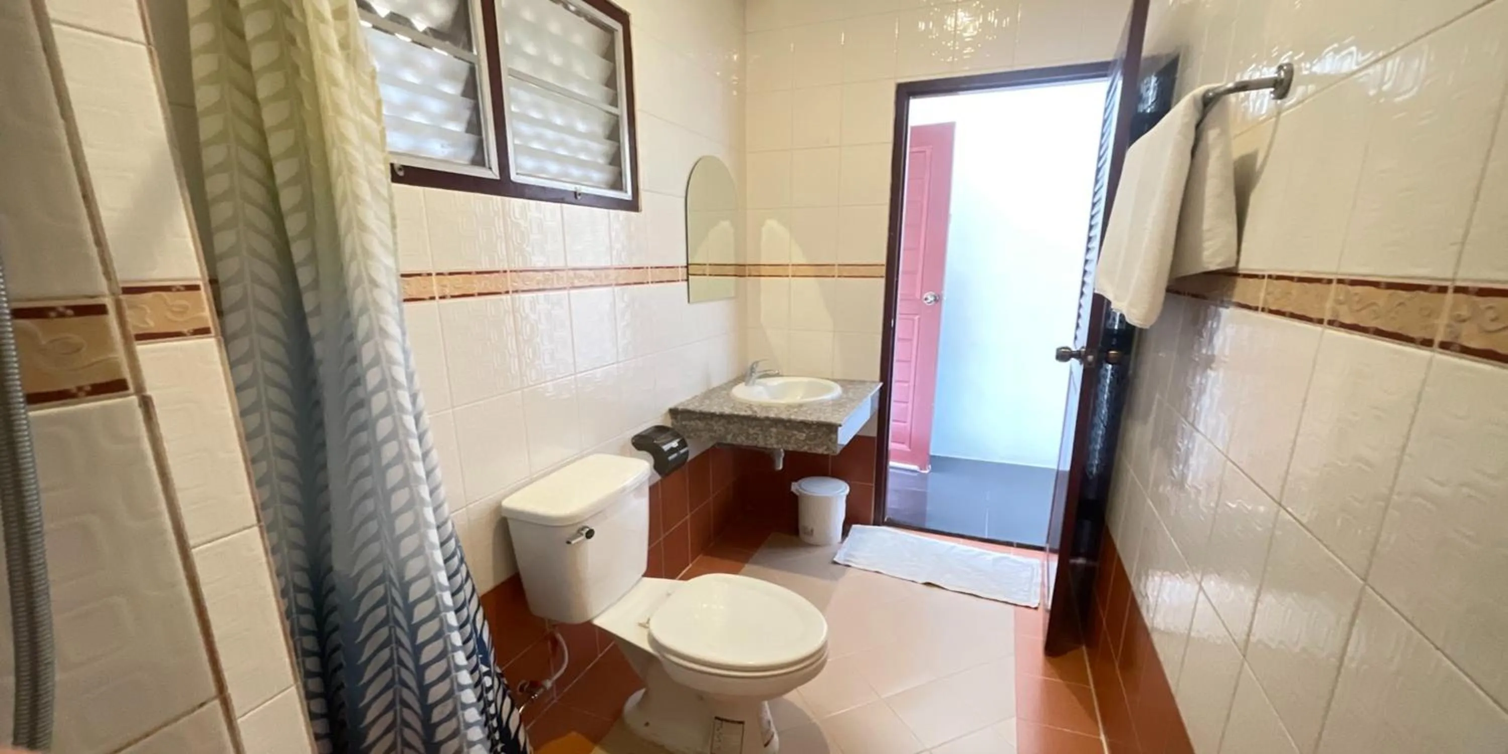 Toilet in Yellow Tique Hotel