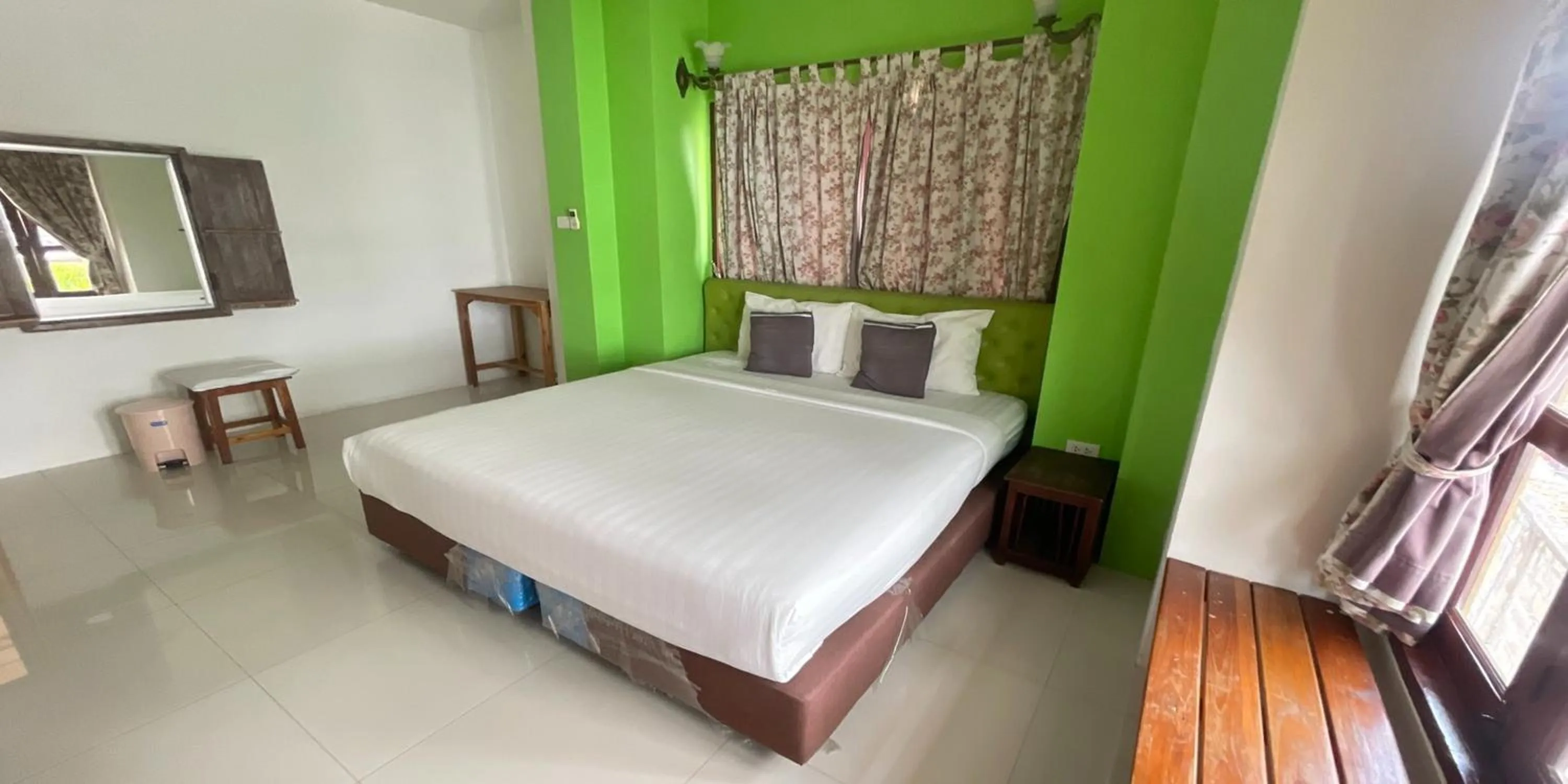 Bed in Yellow Tique Hotel