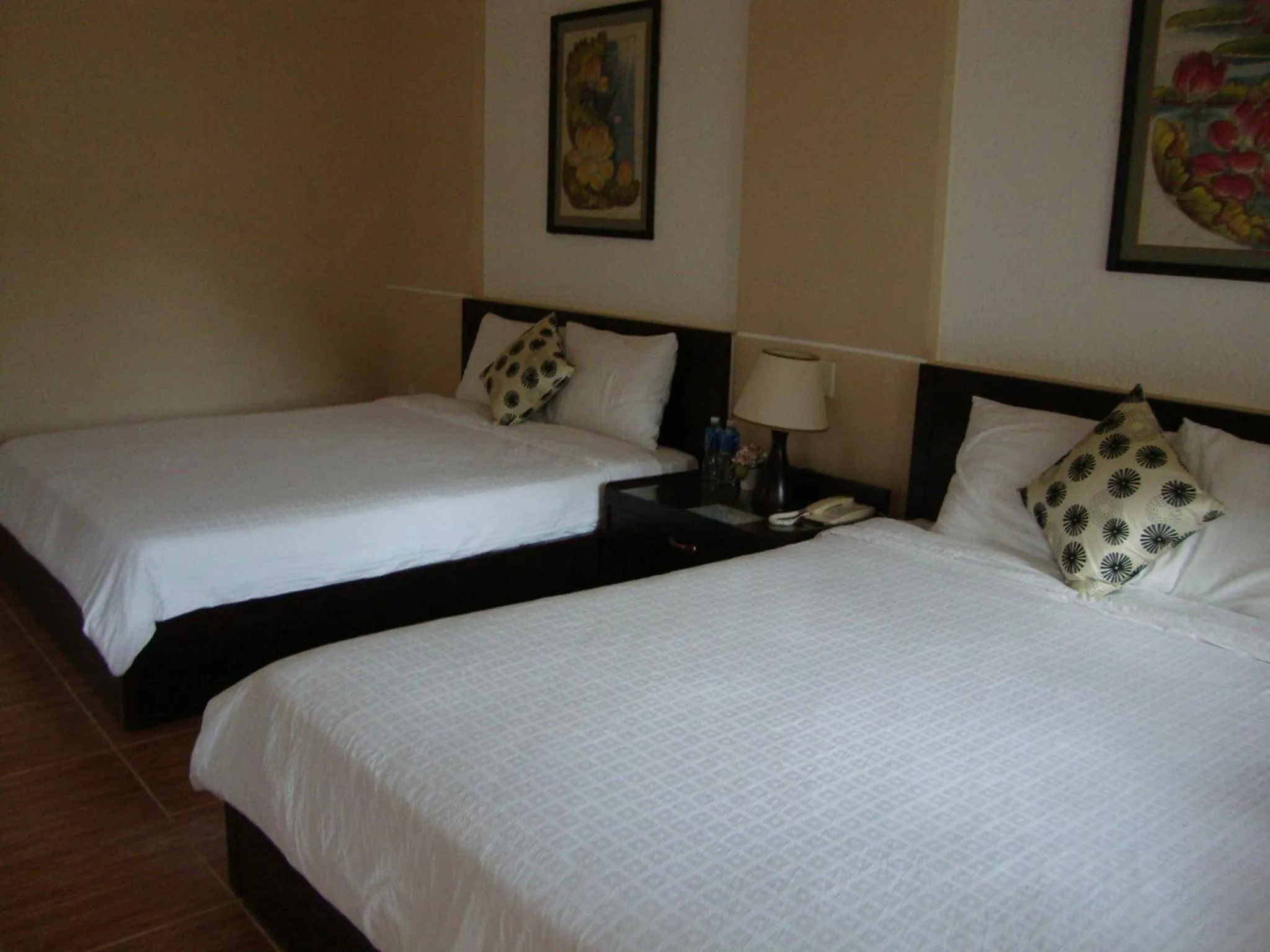 Bed in Orchid Boutique Beach Resort