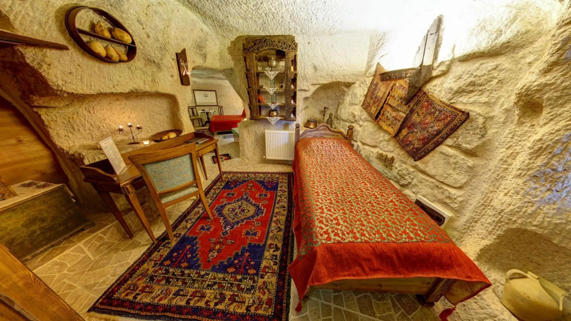 Seating area, Bed in Turkish Cave House