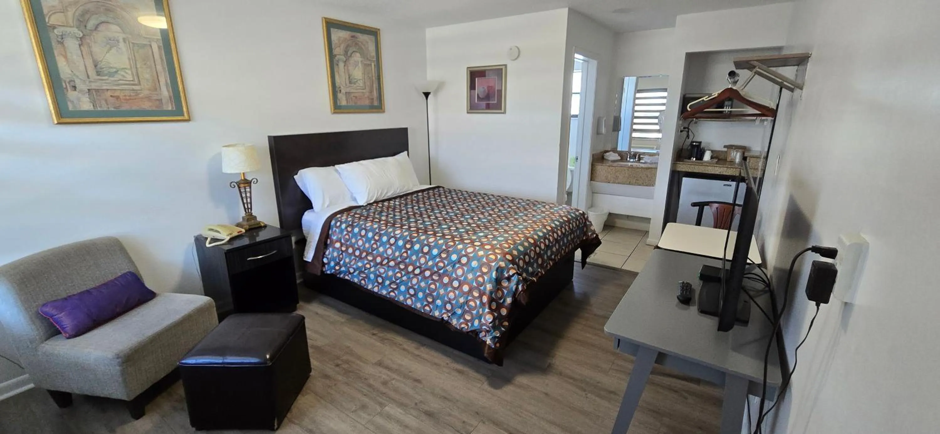 Bed in Merida Inn & Suites