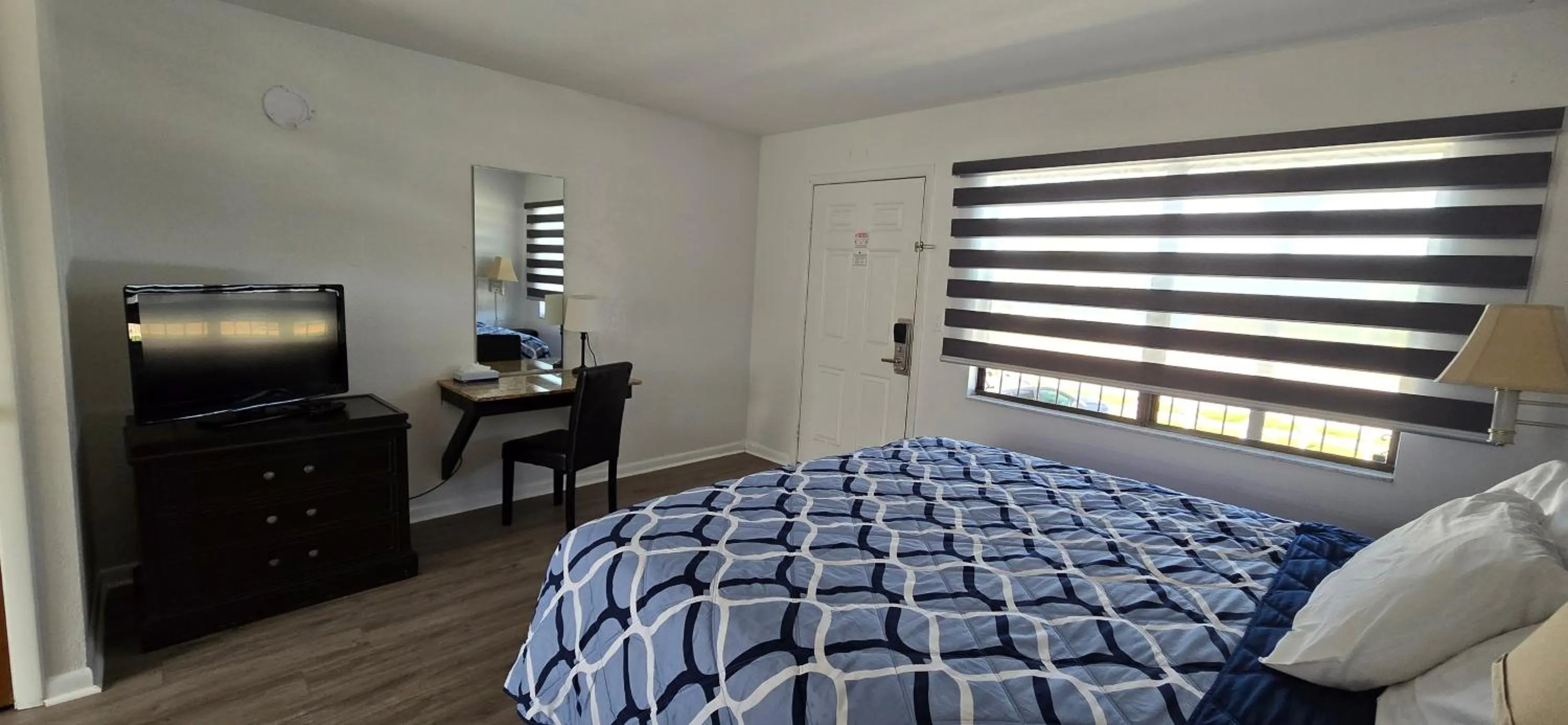 Bed in Merida Inn & Suites