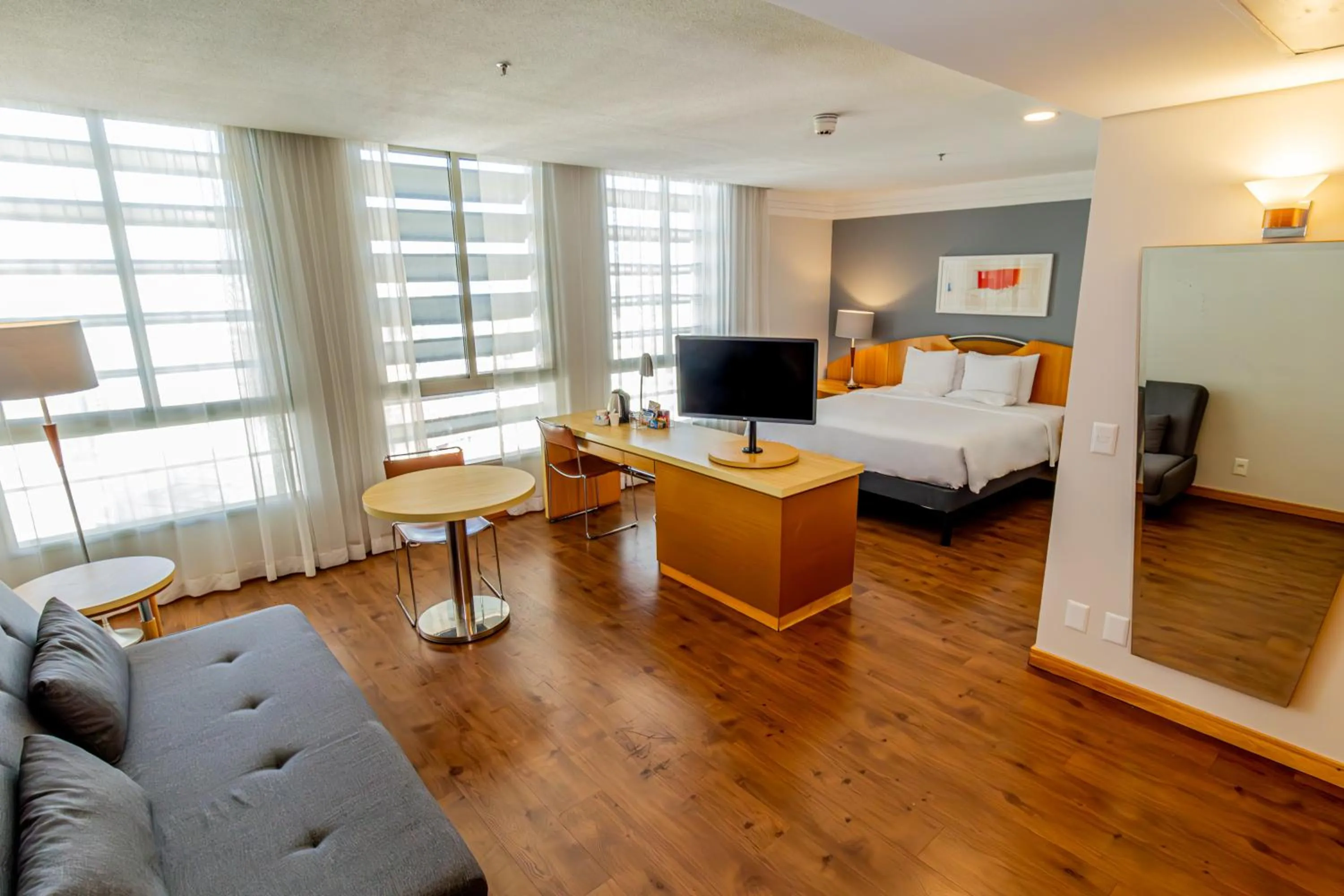 Communal lounge/ TV room, Bed in Hotel Nacional Inn Jaragua Sao Paulo