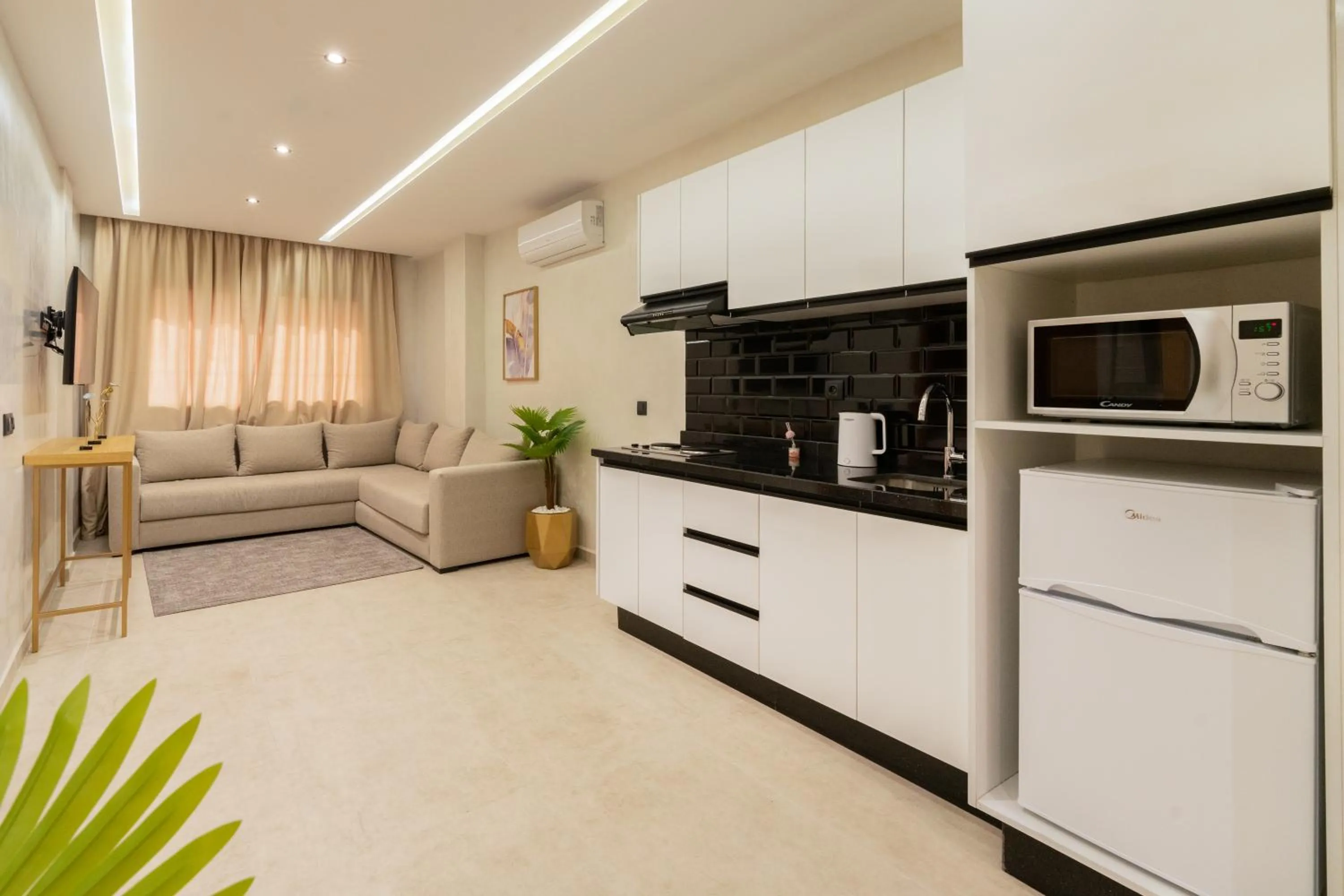 Kitchen or kitchenette in Appart Hôtel Rambla