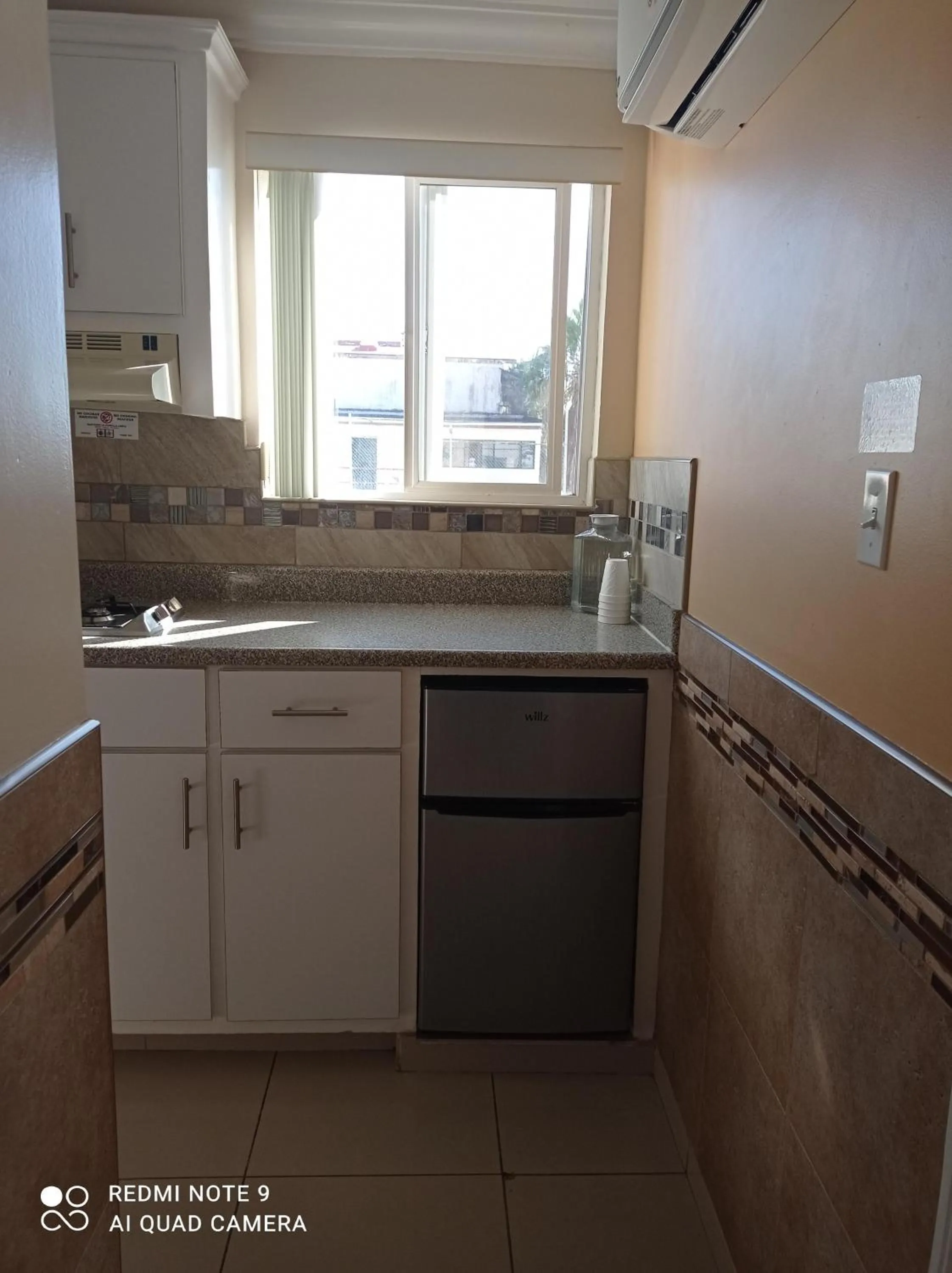 Kitchen or kitchenette in Suites Leon Rojo