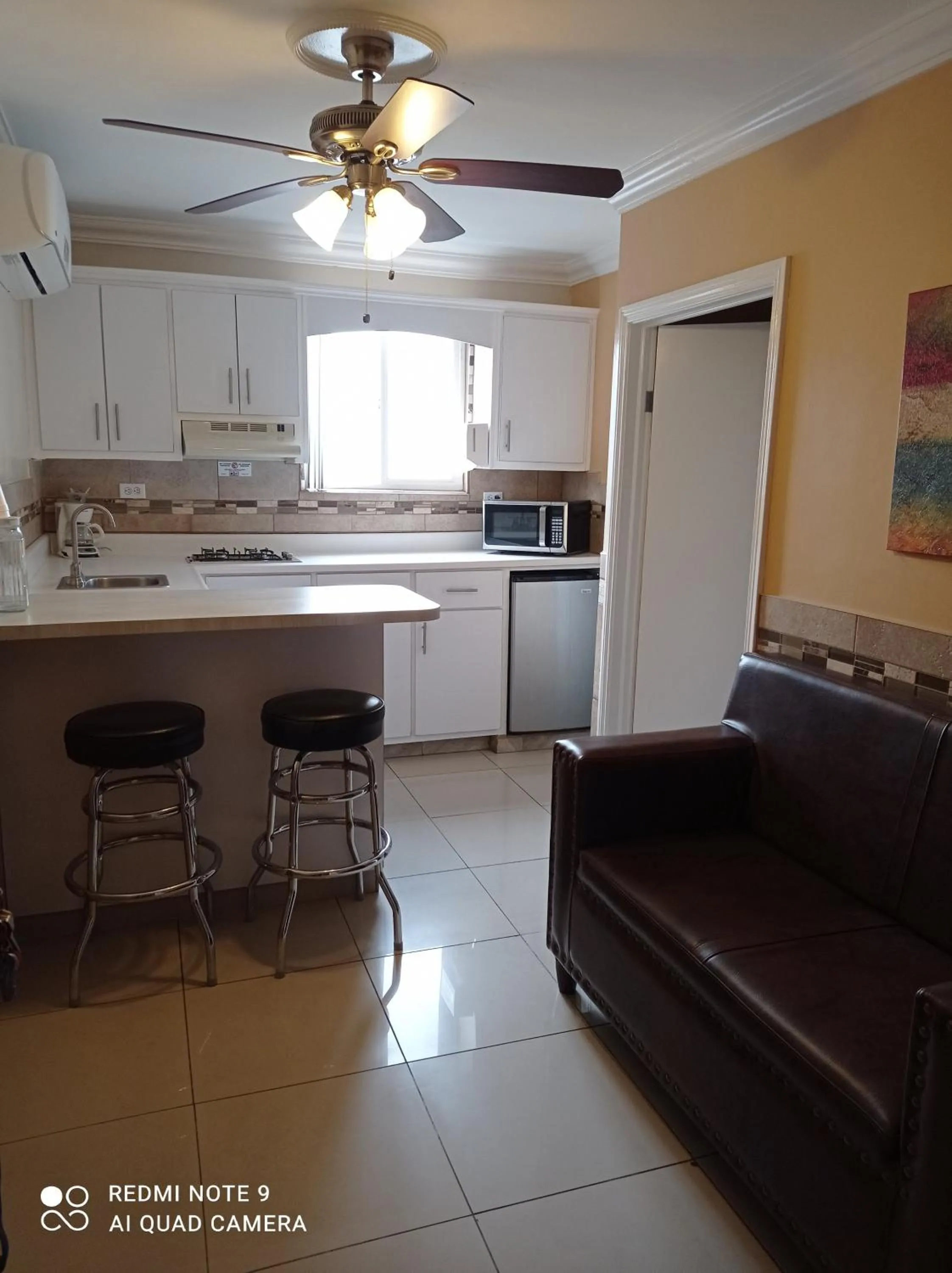 Kitchen or kitchenette in Suites Leon Rojo