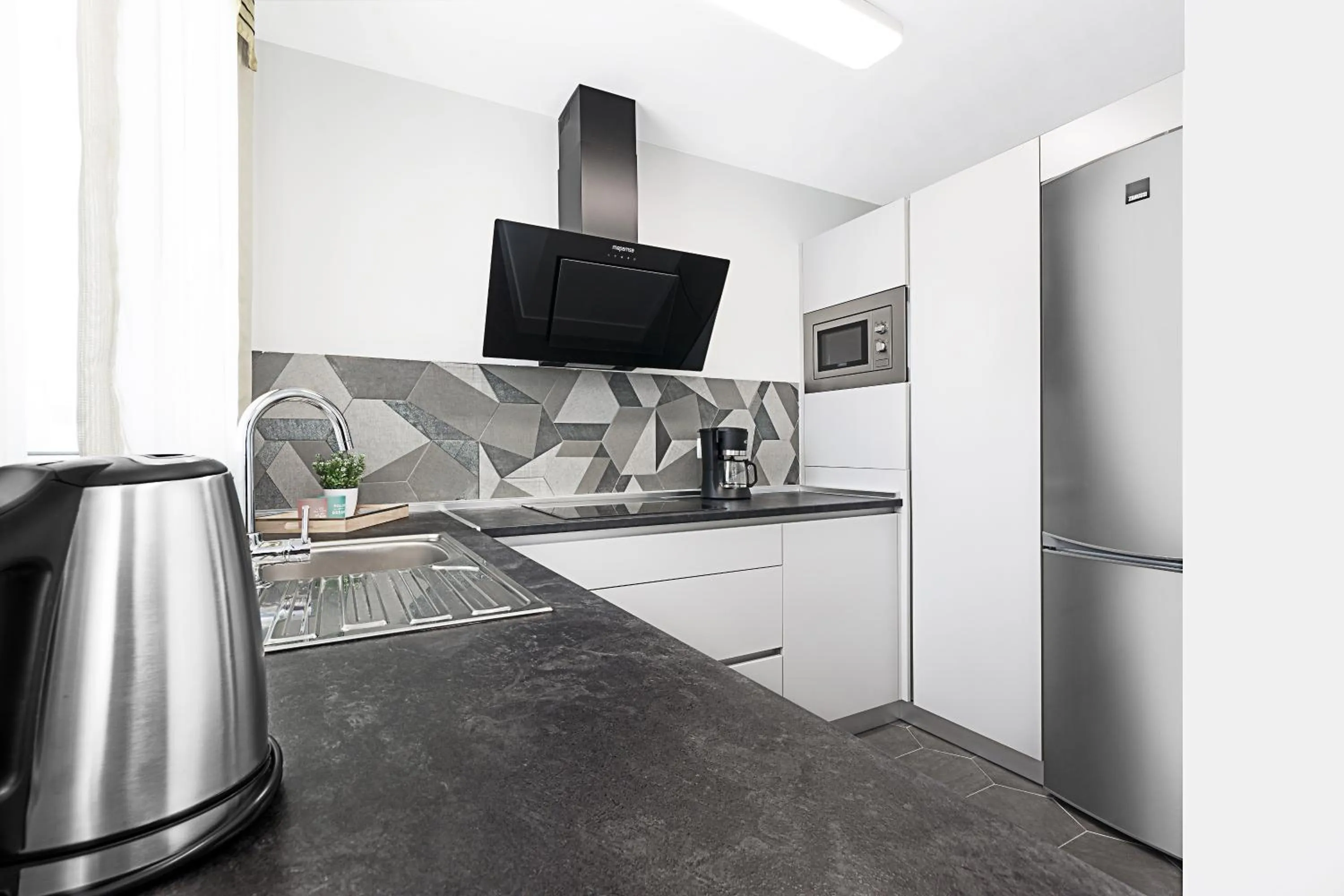 Kitchen or kitchenette in Apartamentos Perla Marina