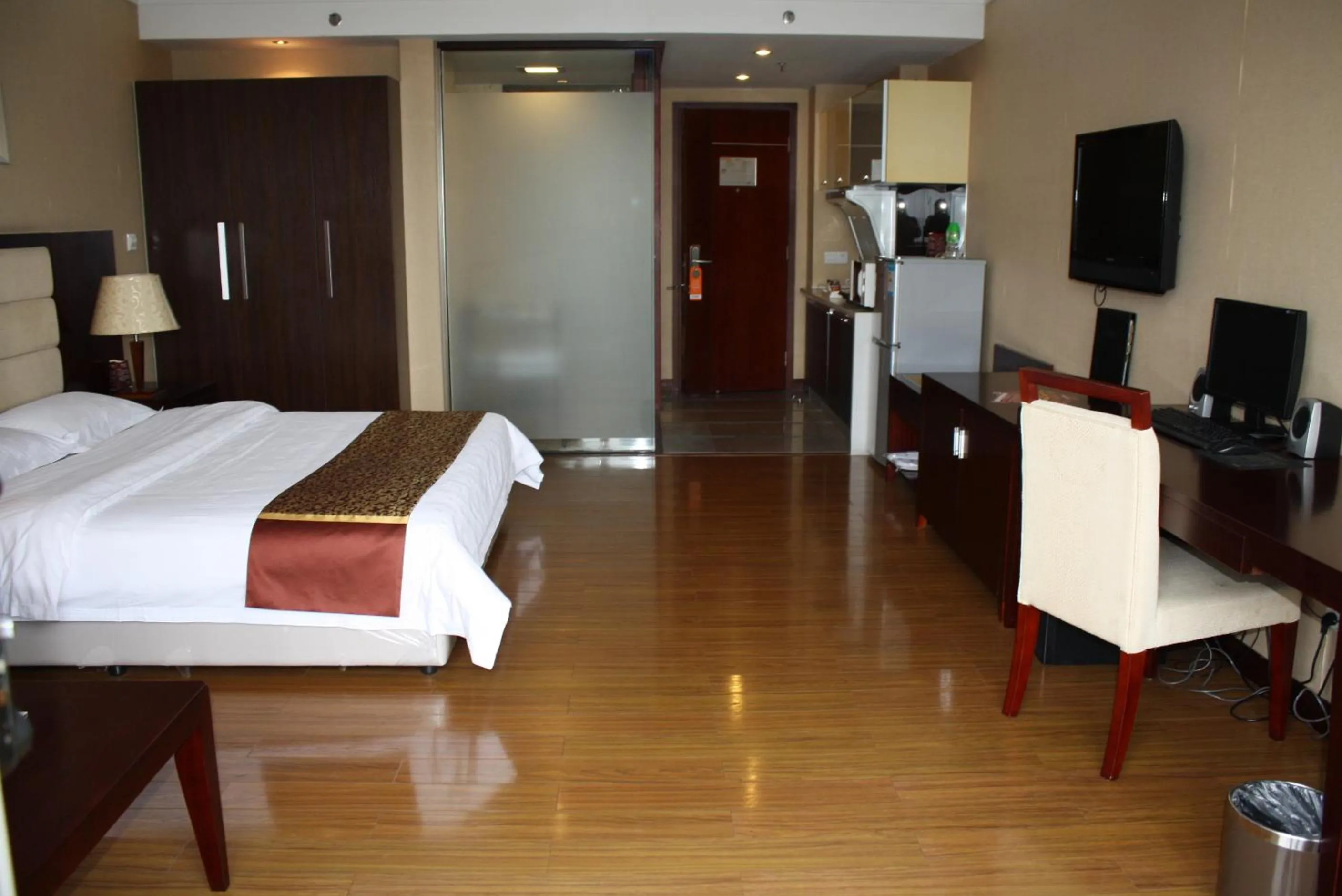 Photo of the whole room in 悦丰酒店广州银丰国际公寓北站店