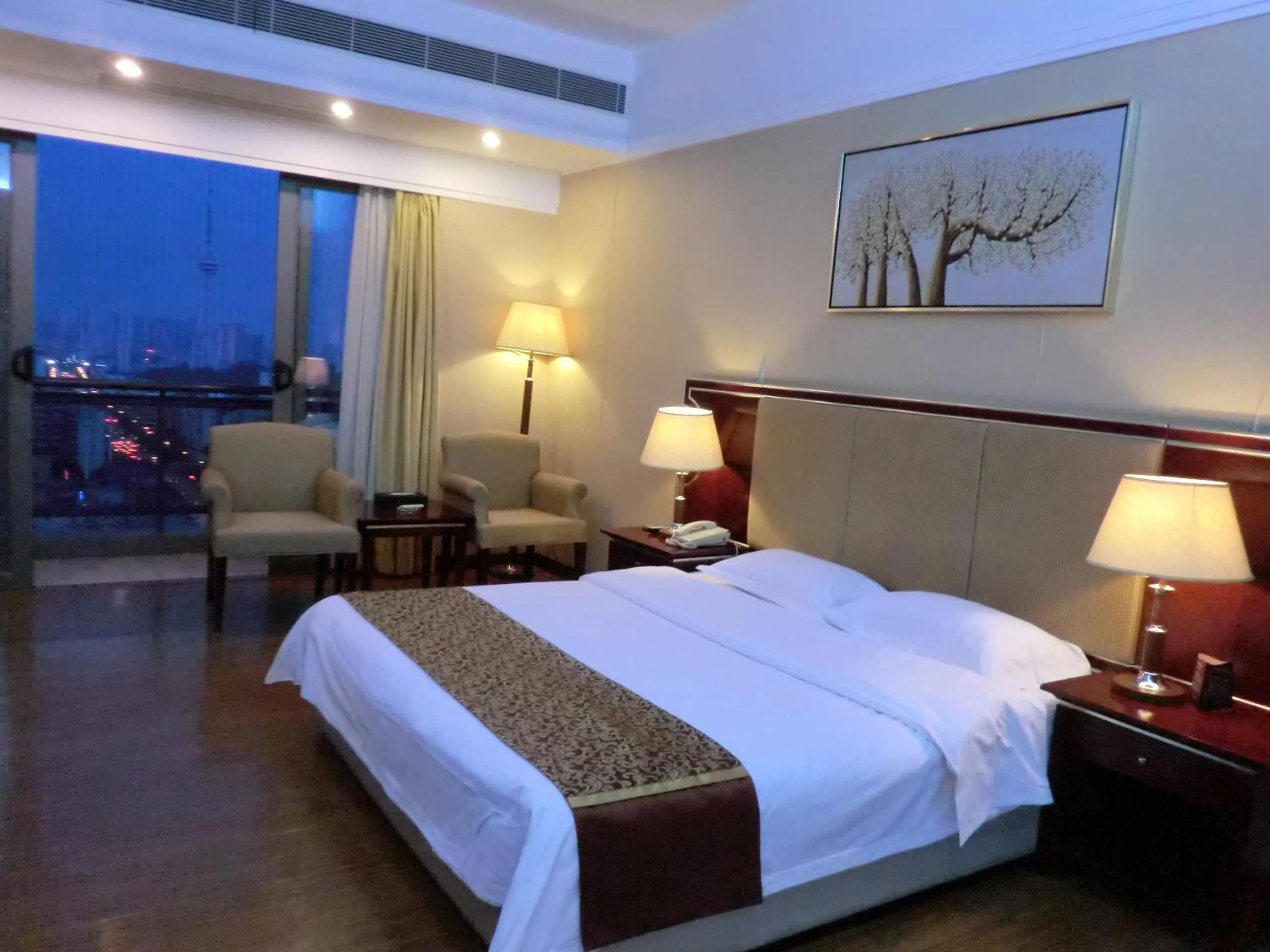 Bedroom, Bed in 悦丰酒店广州银丰国际公寓北站店