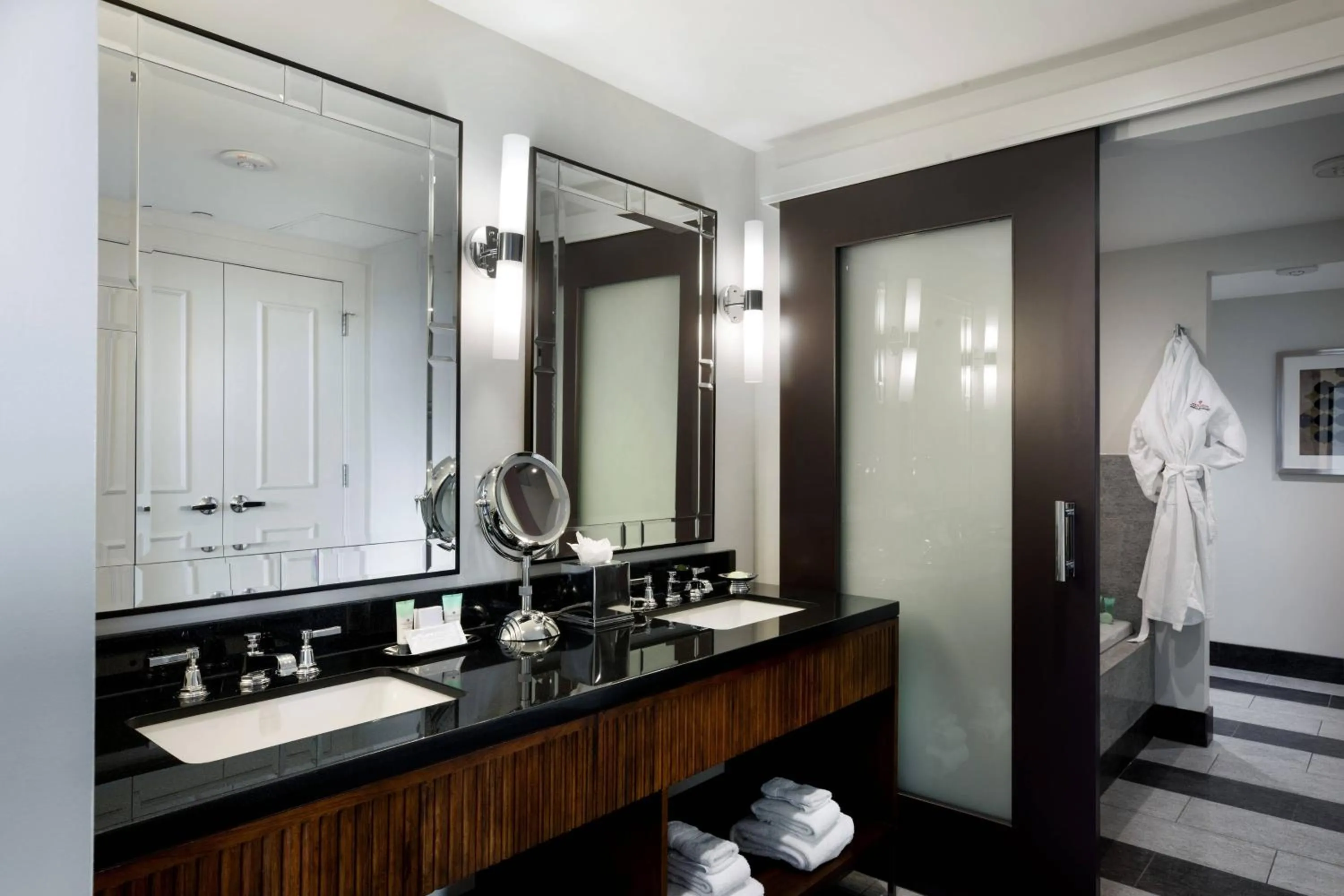 Bathroom in Ambassador Hotel Wichita, Autograph Collection